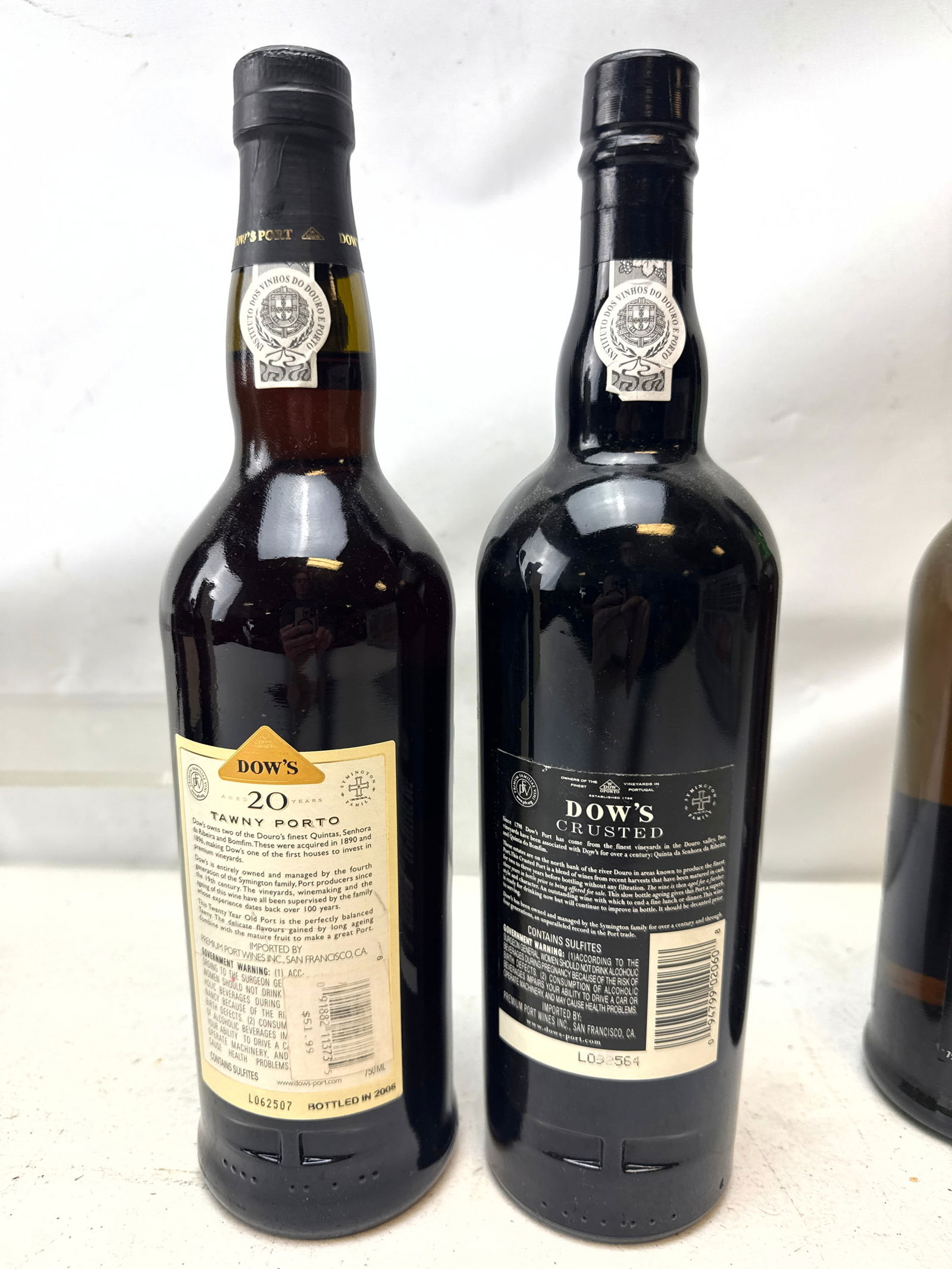7 bottles Portuguese Port wines from several prominent producers including Dow's, Romariz, Taylor Fl - 7