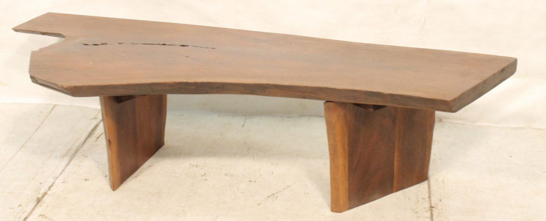 Free Form Wood Slab Coffee Table. NAKASHIMA style: Free Form Wood Slab Coffee Table. NAKASHIMA style. On two slab legs. -- Dimensions: H: 17 inches: D: 28.75 inches: L: 68 inches ---