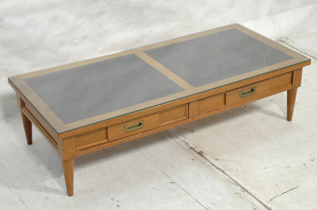 American of Martinsville Cocktail Coffee Table. W: American of Martinsville Cocktail Coffee Table. Wood frame with two inset black laminate areas. Two drawers with brass hardware. -- Dimensions: H: 13.75 inches: D: 23.25 inches: L: 52 inches ---
