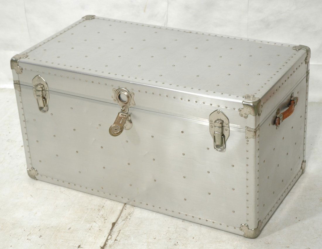 Large Industrial Aluminum Trunk Cocktail Table. R: Large Industrial Aluminum Trunk Cocktail Table. Riveted construction. -- Dimensions: H: 21.25 inches: W: 39.75 inches: D: 21.25 inches ---
