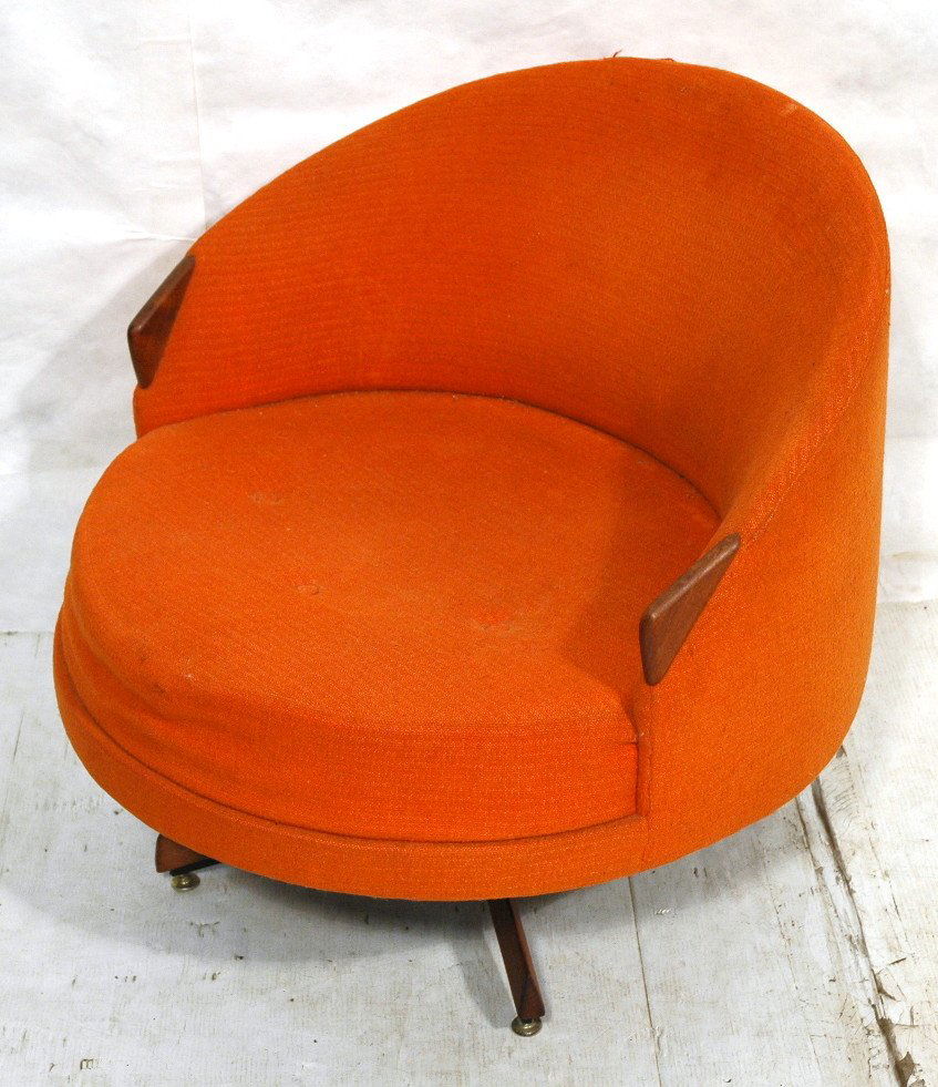 ADRIAN PEARSALL Barrel Back Orange Lounge Chair.: ADRIAN PEARSALL Barrel Back Orange Lounge Chair. Circular chair is completely upholstered in original orange fabric with walnut arm rests. Angled our leg pedestal base.-- Dimensions: H: 29 inches: W: