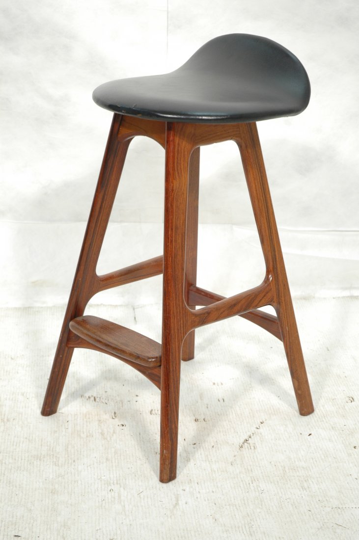 ERIC BUCK Rosewood Stool with Black Vinyl Swoop S: ERIC BUCK Rosewood Stool with Black Vinyl Swoop Seat. Danish Modern. Foil label: ODDENSE MASKINSMEDKERI A-S.-- Dimensions: H: 29.25 inches: W: 14.25 inches: D: 14 inches ---