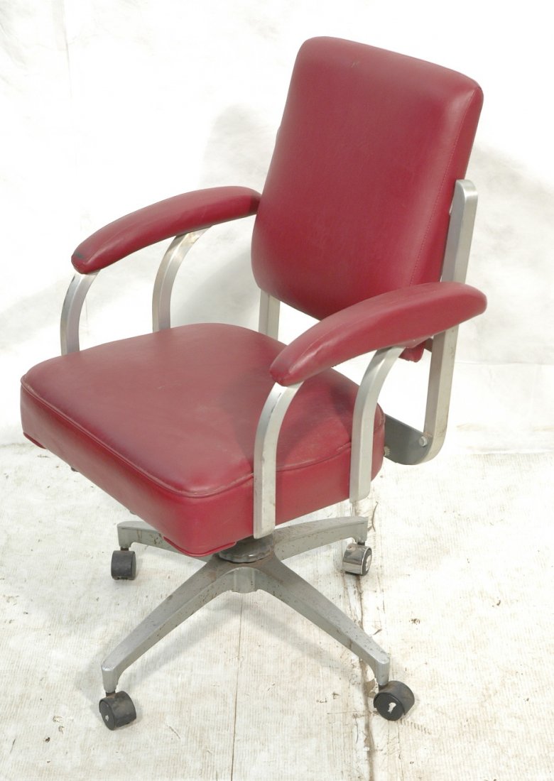 Rolling GOODFORM style Aluminum Office Chair. Win: Rolling GOODFORM style Aluminum Office Chair. Wine colored vinyl. Double arm with upholstered armrest. Not marked.-- Dimensions: H: 39 inches: W: 26 inches: D: 22 inches ---