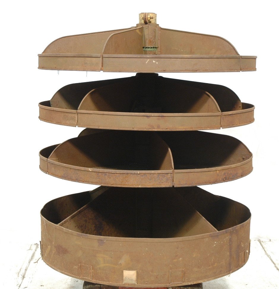 Industrial Metal Four Rotating Tier Storage Bin.: Industrial Metal Four Rotating Tier Storage Bin. Brown metal. Tiers with compartments. -- Dimensions: H: 38 inches: W: 35 inches: D: 35 inches ---