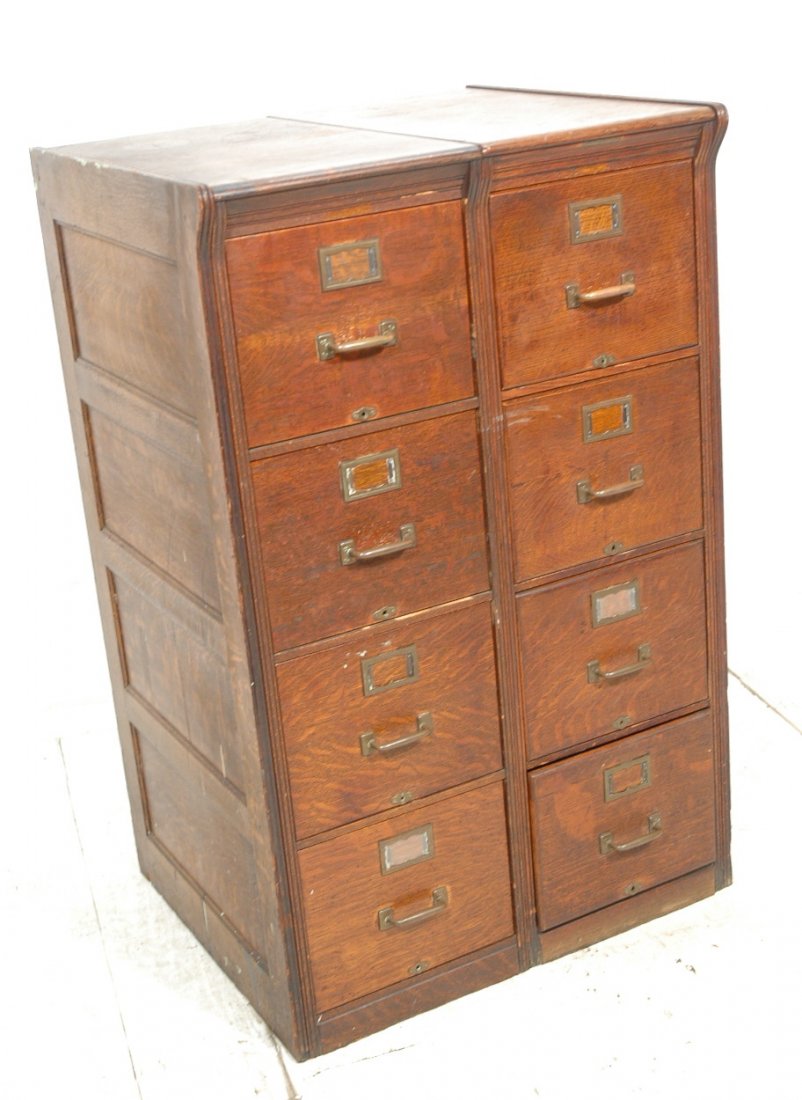 Oak File Cabinet. One unit with 8 drawers. Brass: Oak File Cabinet. One unit with 8 drawers. Brass hardware. -- Dimensions: H: 53 inches: W: 33.5 inches: D: 29 inches ---