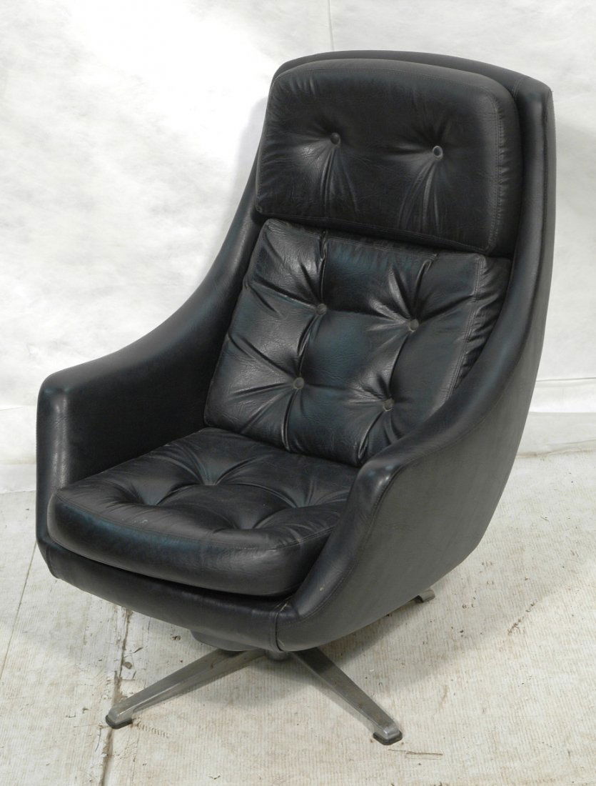 OVERMAN USA Tall Space Age Egg Lounge Chair. Swiv: OVERMAN USA Tall Space Age Egg Lounge Chair. Swivels & rocks. Rocker rocking chair. Four legged aluminum base. Tufted black vinyl. Tag.-- Dimensions: H: 39 inches: W: 31 inches: D: 30 inches ---
