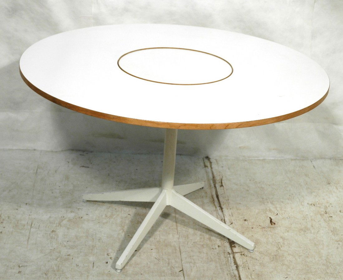 GEORGE NELSON for HERMAN MILLER Dining Table. Whi: GEORGE NELSON for HERMAN MILLER Dining Table. White laminate top with Lazy Susan center on white base.-- Dimensions: H: 29 inches: W: 47.5 inches ---