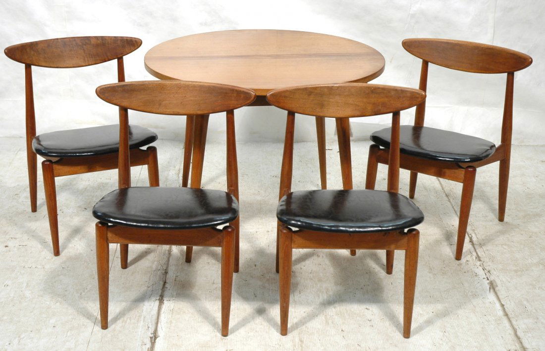 Bertha Schaefer Dining Set. Round Table with 4 1: Bertha Schaefer Dining Set. Round Table with 4 16.5 inch leaves. 4 Chairs with arched backs.-- Dimensions: H: 29.25 inches: W: 38 inches ---