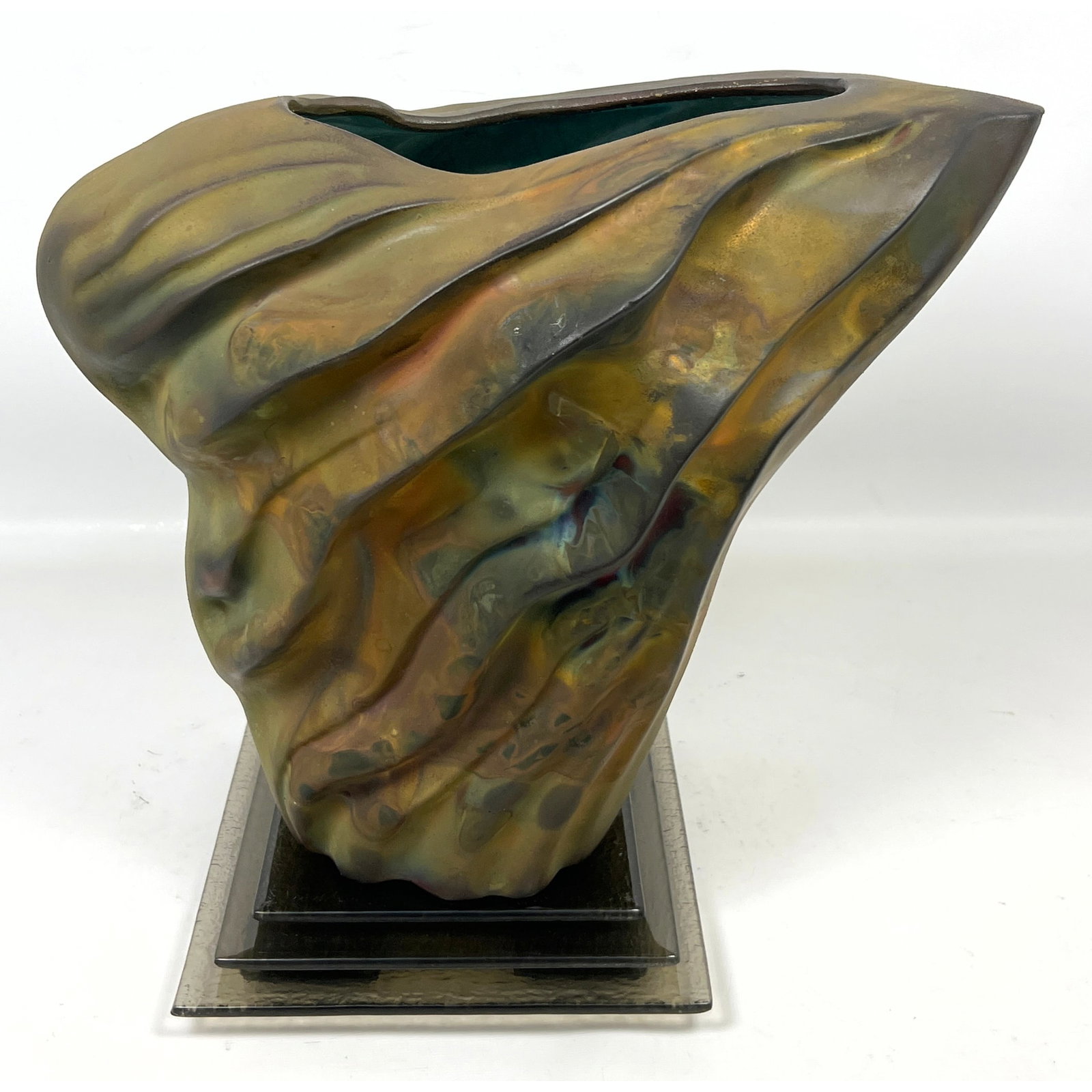 Tony Evans studio Pottery Vase.: Tony Evans studio Pottery Vase. Dimensions: Height: 13.5 inches, Width: 14 inches, Depth: 7.75 inches. --- US Packing and Shipping charge: In house shipping available. Will be calculated once destinat