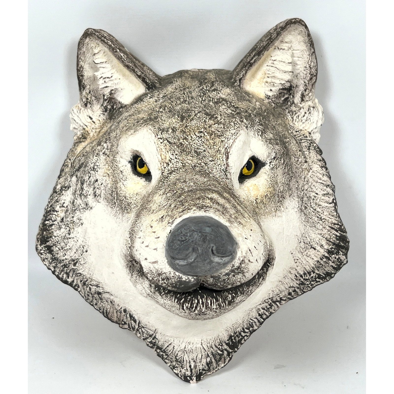 Decorative Pottery wall sculpture depicting a gray wolf head in a forward-facing pose (1 of 9)