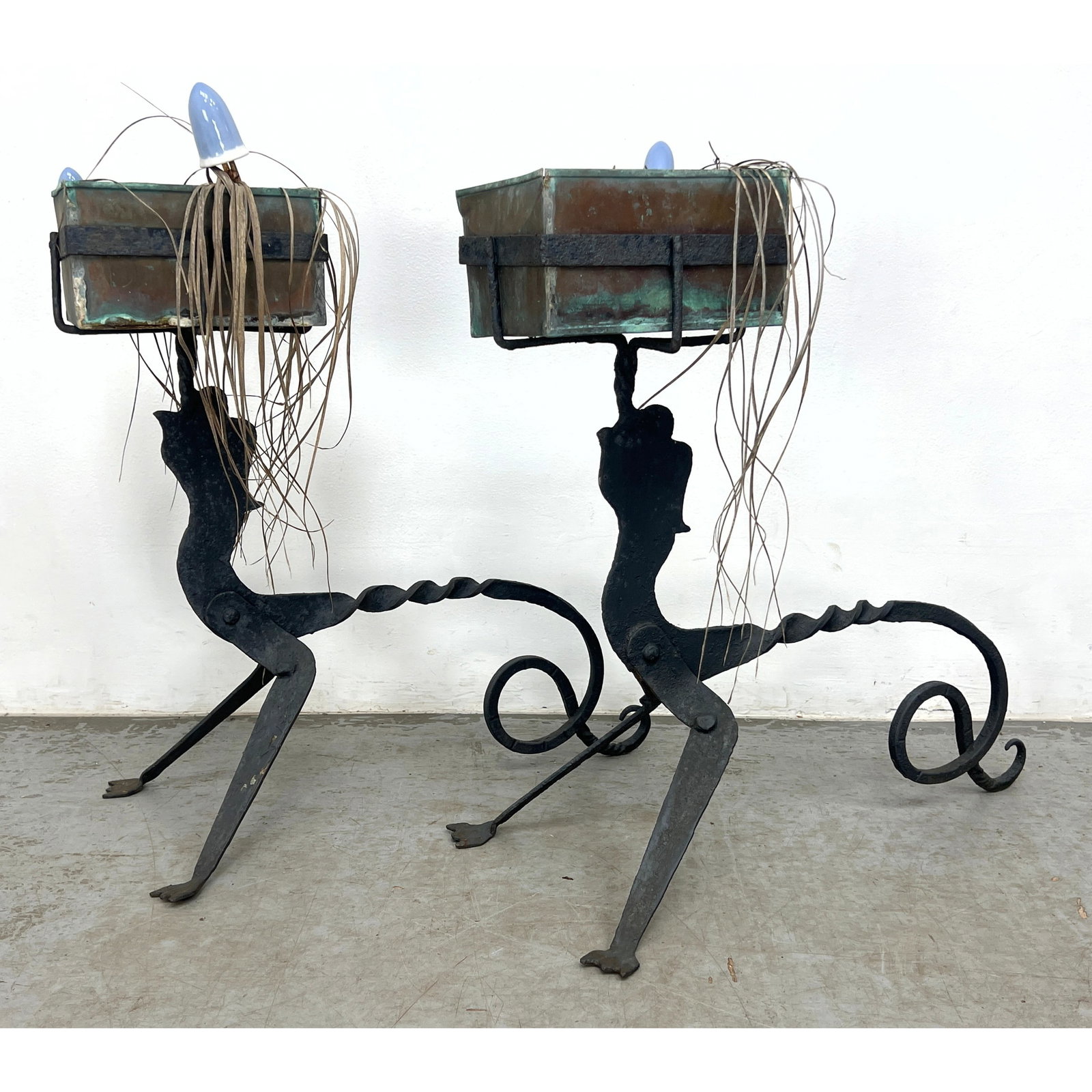 Pair of antique Forged Iron Fantasy Figural Animal Planter. Garden Plant Stands. Twisted Iron with C: Pair of antique Forged Iron Fantasy Figural Animal Planter. Garden Plant Stands. Twisted Iron with Curled Tails. mer-creature Dimensions: Height: 31 inches, Width: 26.5 inches, Depth: 14 inches. ---