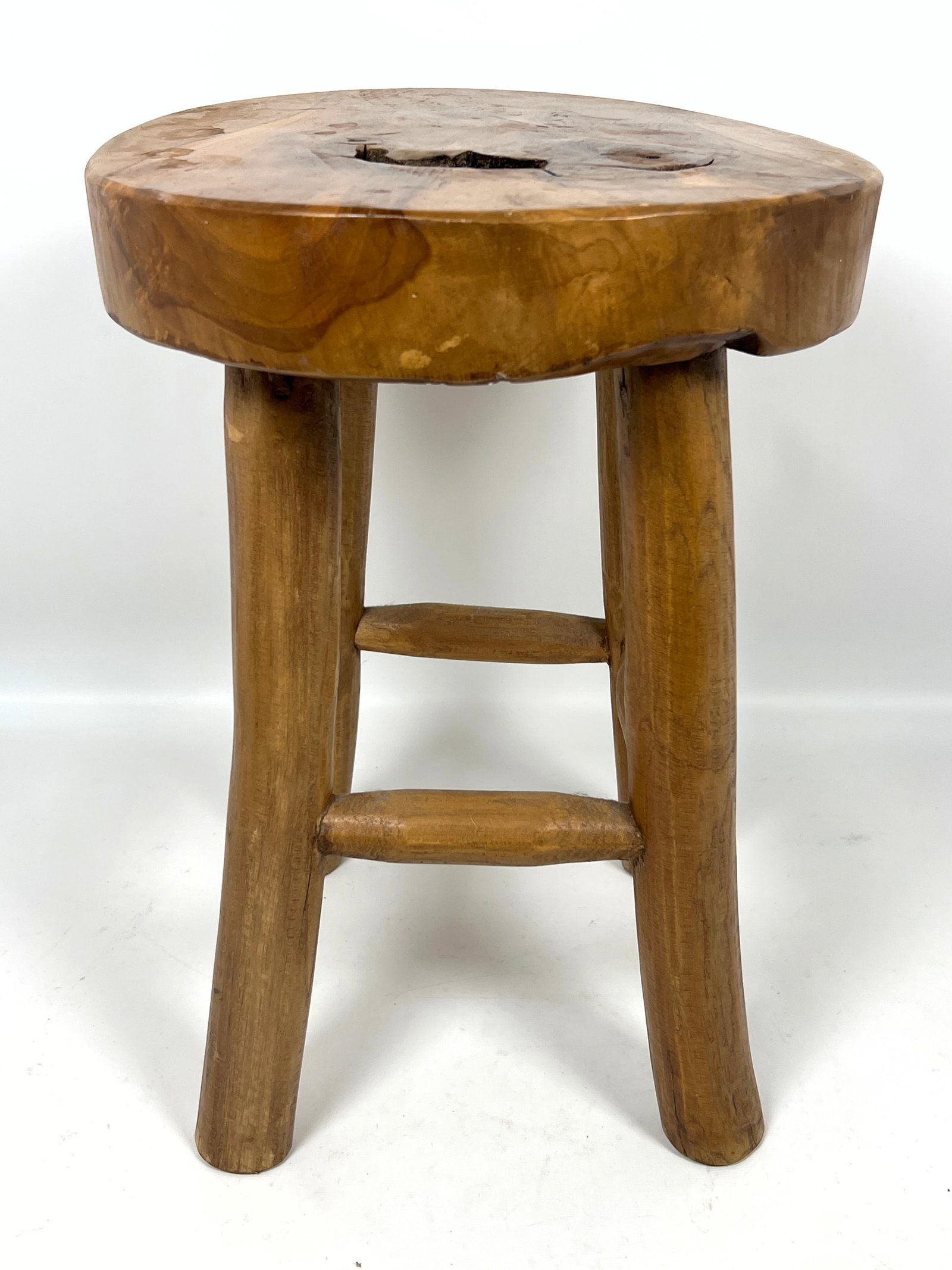 Rustic four-legged stool is constructed from solid teak wood. - 4