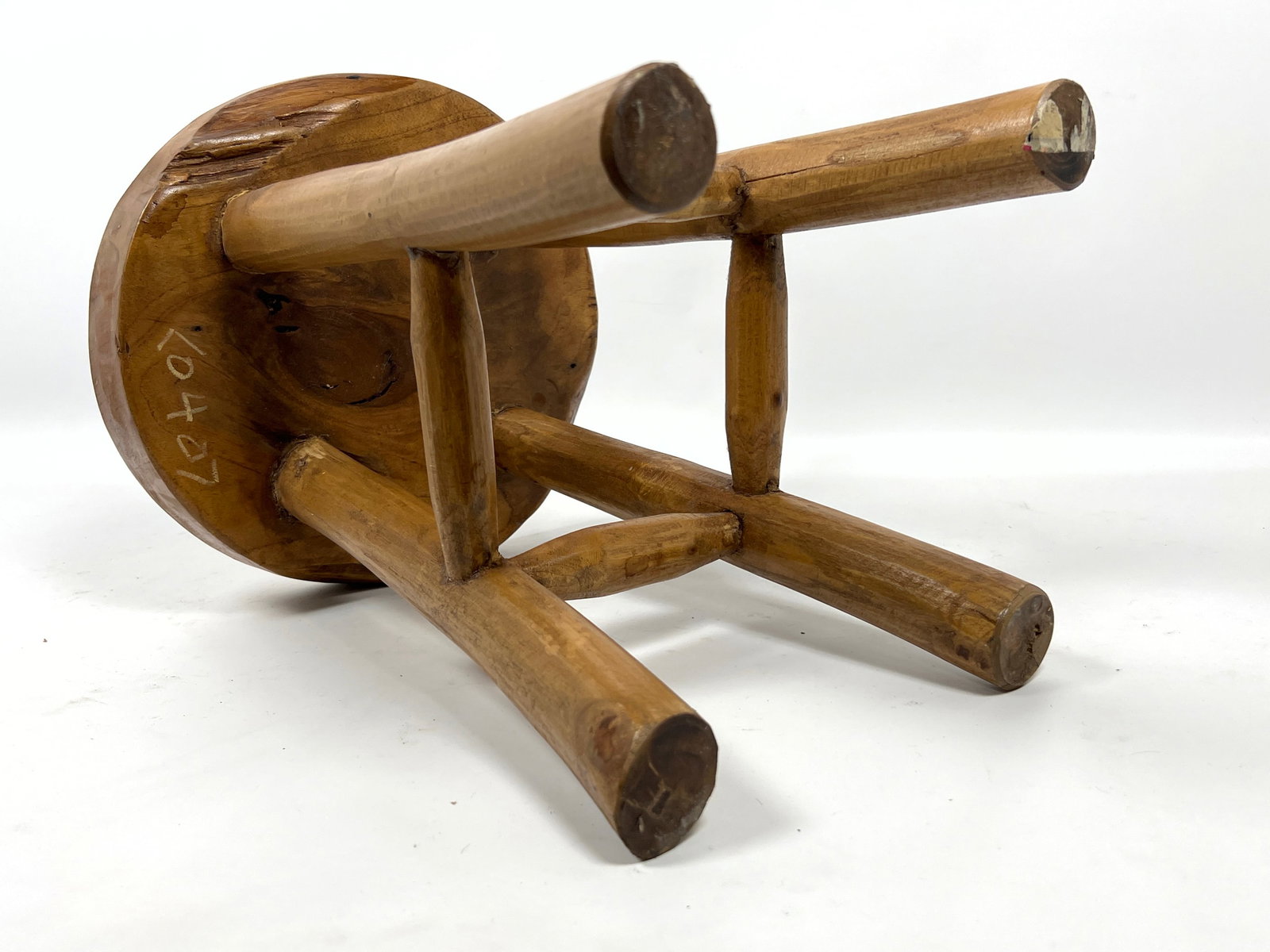 Rustic four-legged stool is constructed from solid teak wood. - 9