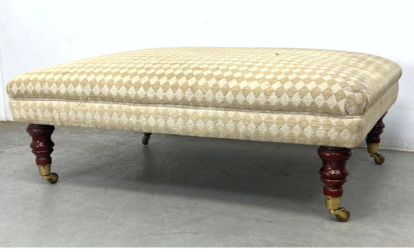 Large Oversized Upholstered Ottoman Bench. Turned wood legs with brass casters. (1 of 10)