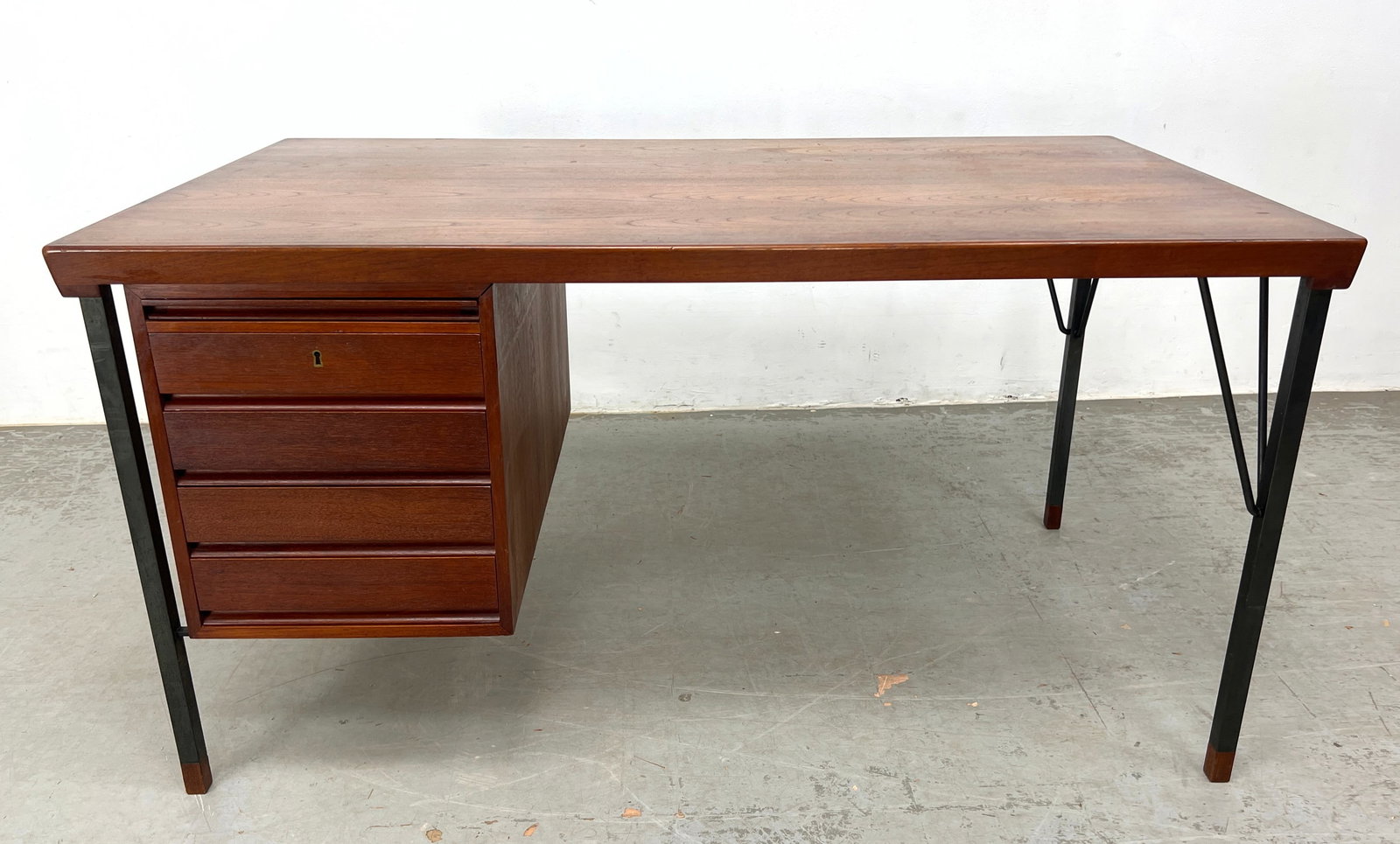 Peter Hvidt Danish Modern Writing Desk with Metal Legs capped in Wood.: Peter Hvidt Danish Modern Writing Desk with Metal Legs capped in Wood. Dimensions: Height: 29 inches, Width: 55 inches, Depth: 31.5 inches. ---
