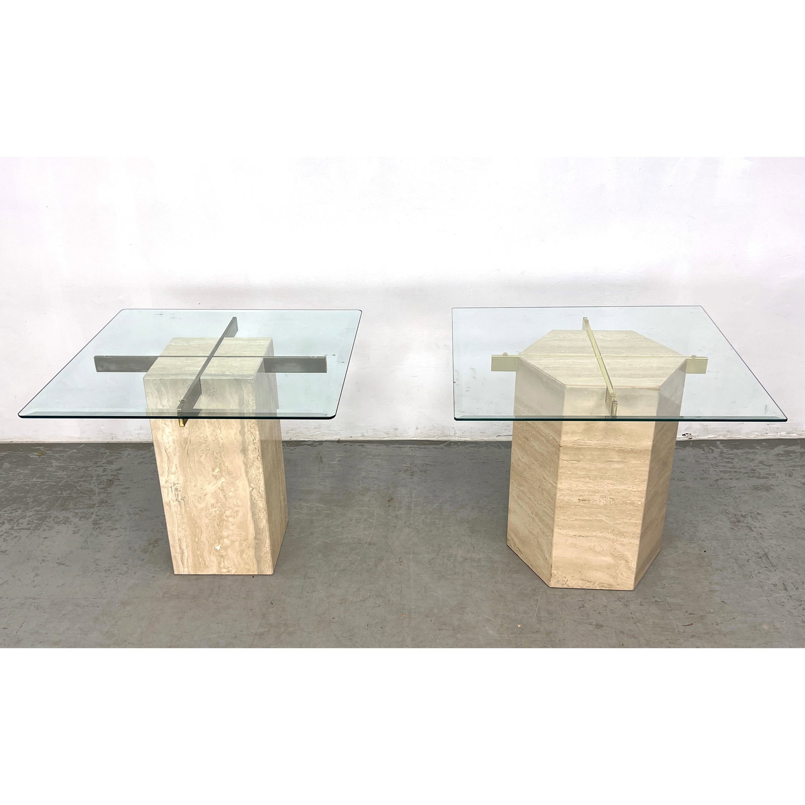 2pcs Artedi Travertine and Glass Side Tables.: 2pcs Artedi Travertine and Glass Side Tables. Dimensions: Height: 22 inches, Width: 26 inches, Depth: 26 inches. ---