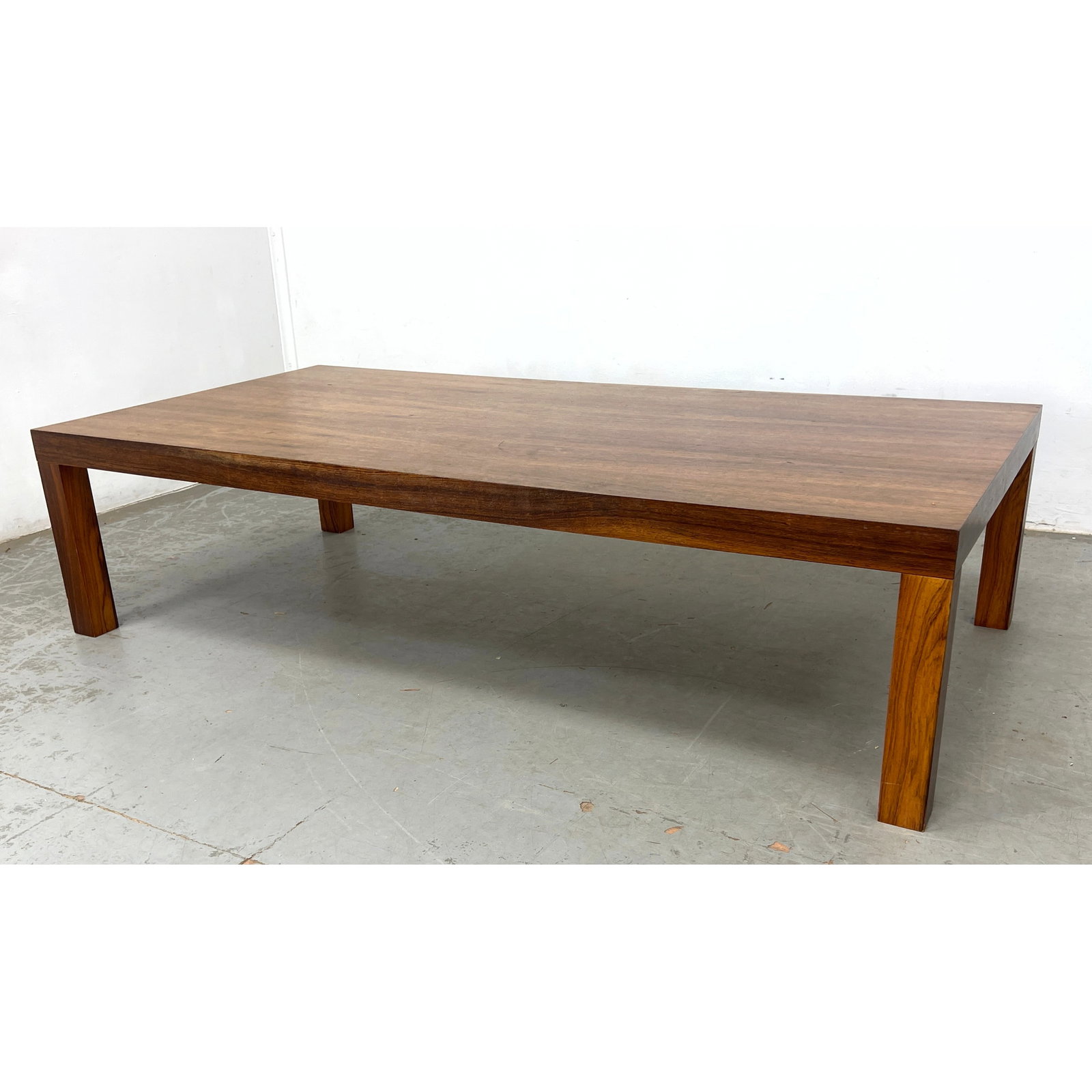 Danish Modern Rosewood Parsons style Coffee Table: Danish Modern Rosewood Parsons style Coffee Table Dimensions: Height: 15 inches, Width: 60 inches, Depth: 29.75 inches. ---