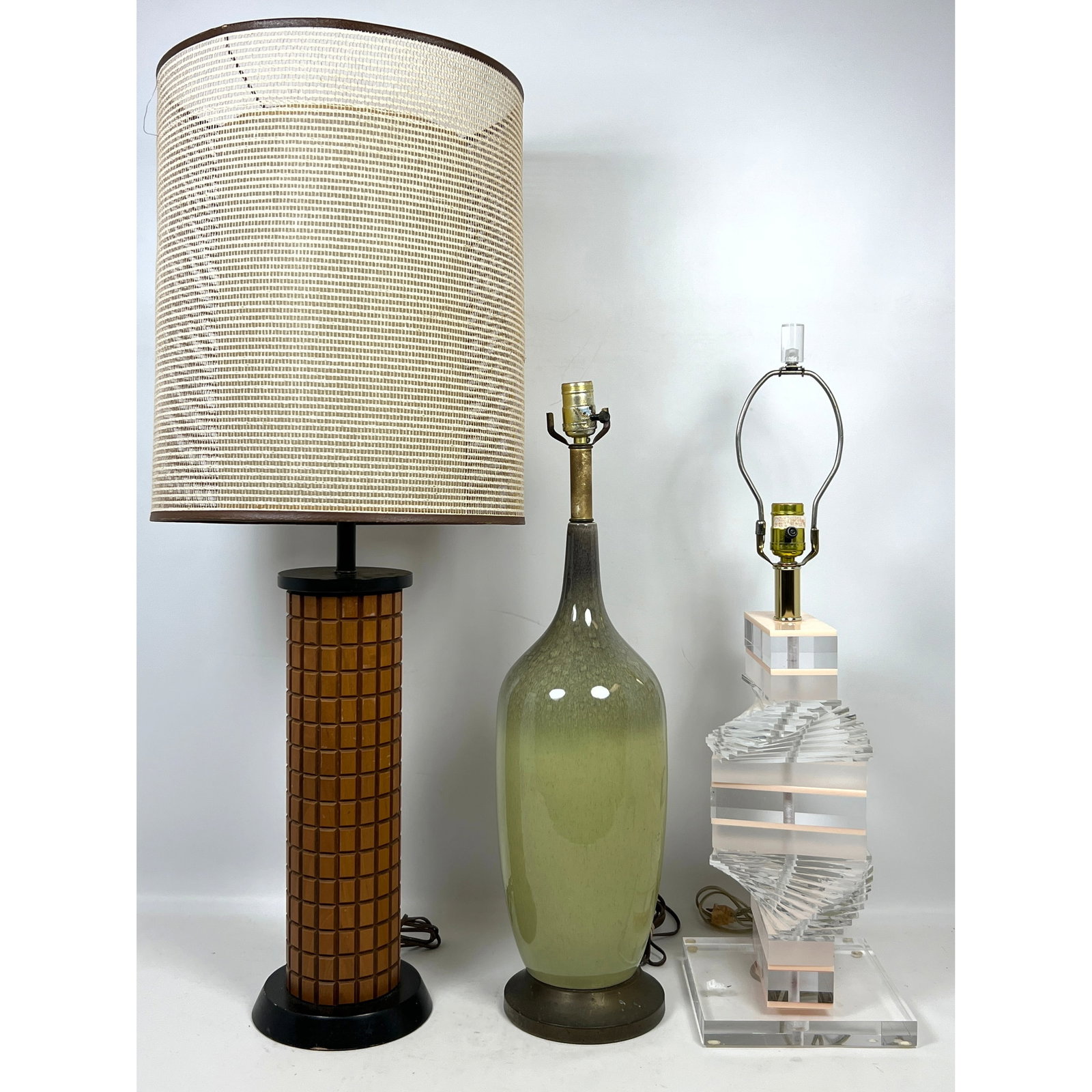 3pcs Mid Century Modern Table Lamps. Pottery, Twisted Lucite and wood slat.: 3pcs Mid Century Modern Table Lamps. Pottery, Twisted Lucite and wood slat. Dimensions: Height: 37 inches, Width: 14 inches, Depth: 14 inches. ---