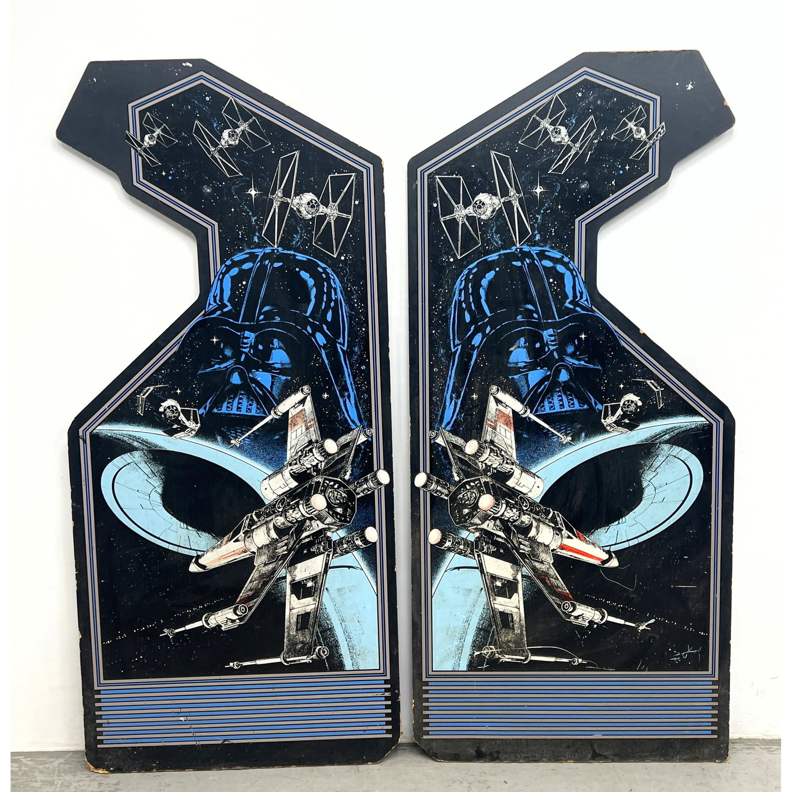 Pair of wood composite side panels from an original 1983 Atari Star Wars upright arcade cabinet. (1 of 15)