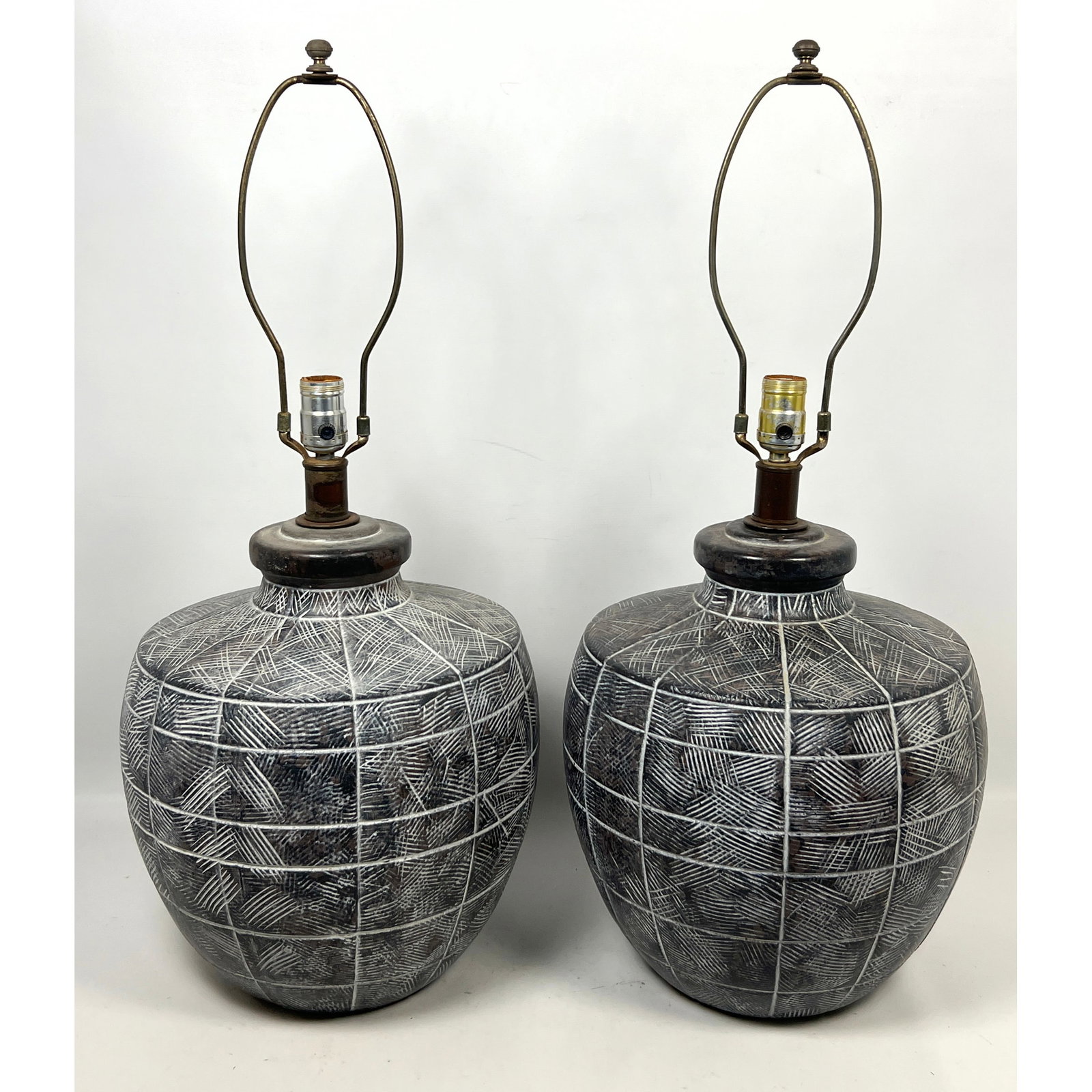 Pair large-scale ceramic table lamps featuring a Mid-Century Modern design. incised pattern. (1 of 12)