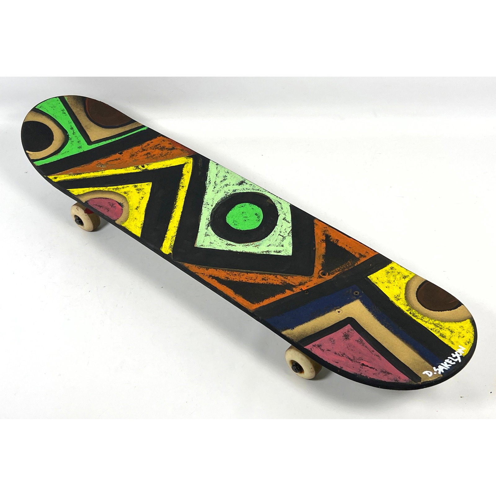 Dennis Sakelson Hand Painted Vintage Skateboard. Krown.: Dennis Sakelson Hand Painted Vintage Skateboard. Krown. Dimensions: Height: 3 inches, Width: 31.25 inches, Depth: 7.75 inches. ---