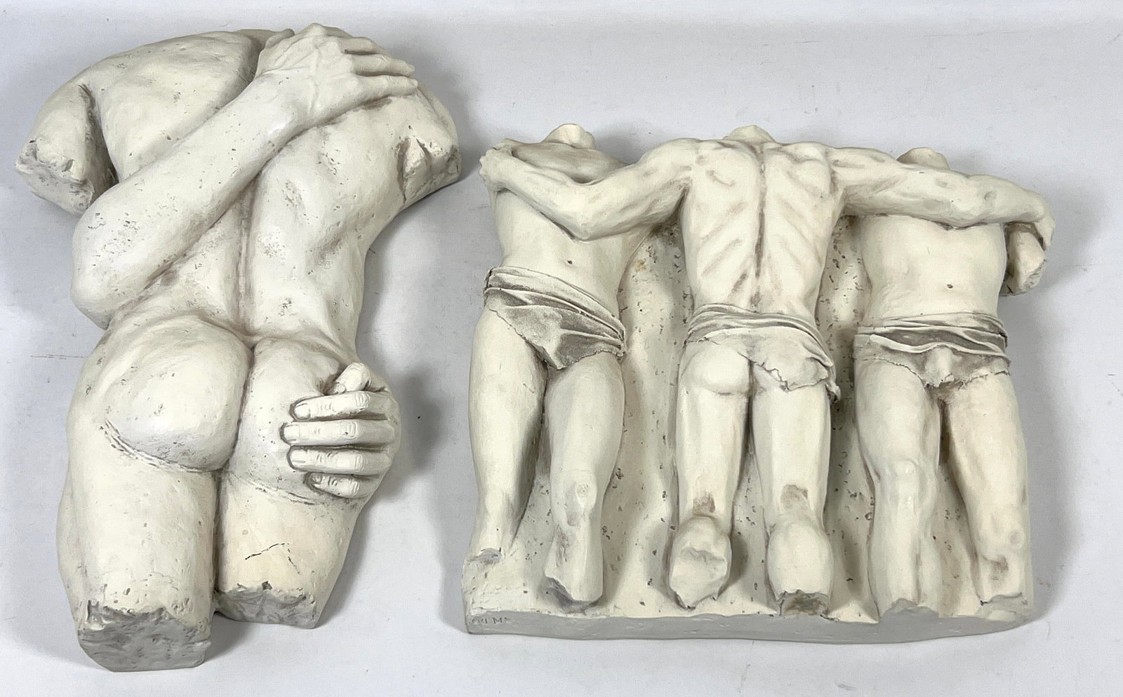 2pc Composite material Semi Male Nude Wall Plaques. Contemporary. Stamped "Desire" TMS.: 2pc Composite material Semi Male Nude Wall Plaques. Contemporary. Stamped "Desire" TMS. Dimensions: Height: 20 inches, Width: 10 inches, Depth: 3.3 inches. - Additional Dimensions: Group H: 15