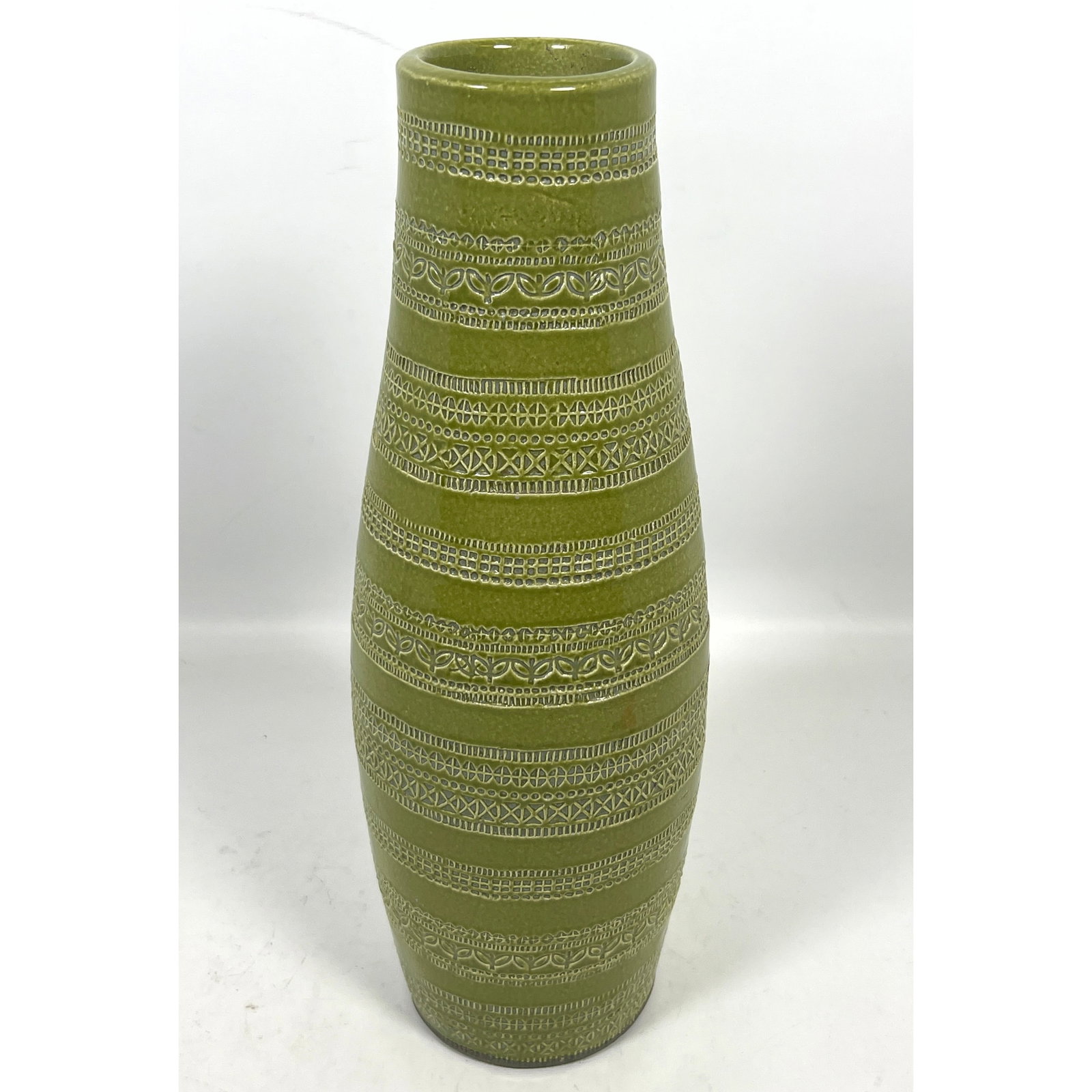 BITOSSI style Incised Glazed Pottery vase. Green Glaze. Modernist Banded Impressed Motif. Aldo Londi: BITOSSI style Incised Glazed Pottery vase. Green Glaze. Modernist Banded Impressed Motif. Aldo Londi. Dimensions: Height: 16 inches, Width: 4.5 inches, Depth: 4.5 inches. ---