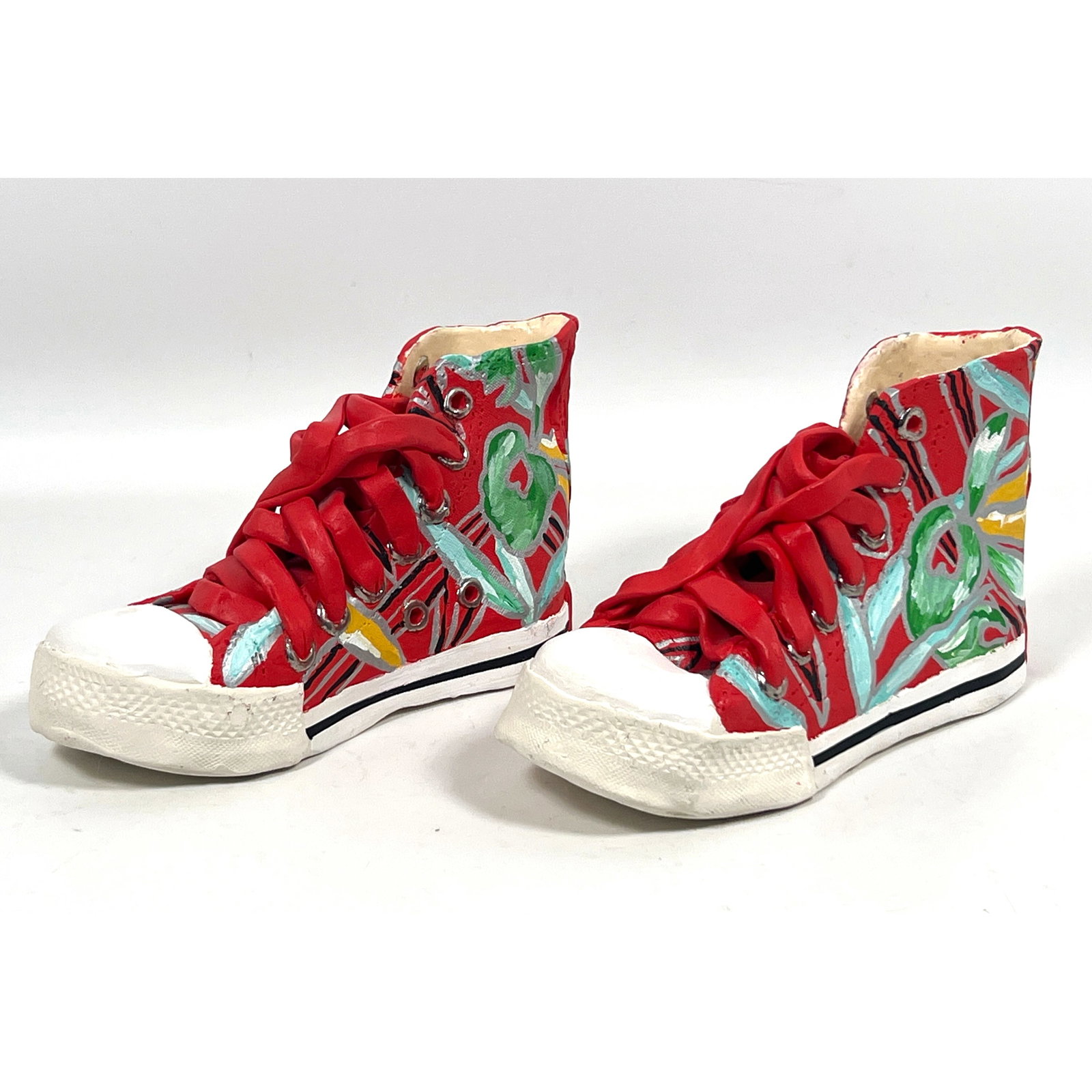 Pair of hand-modeled ceramic sneaker sculptures created in a style reminiscent of Converse All Star (1 of 11)