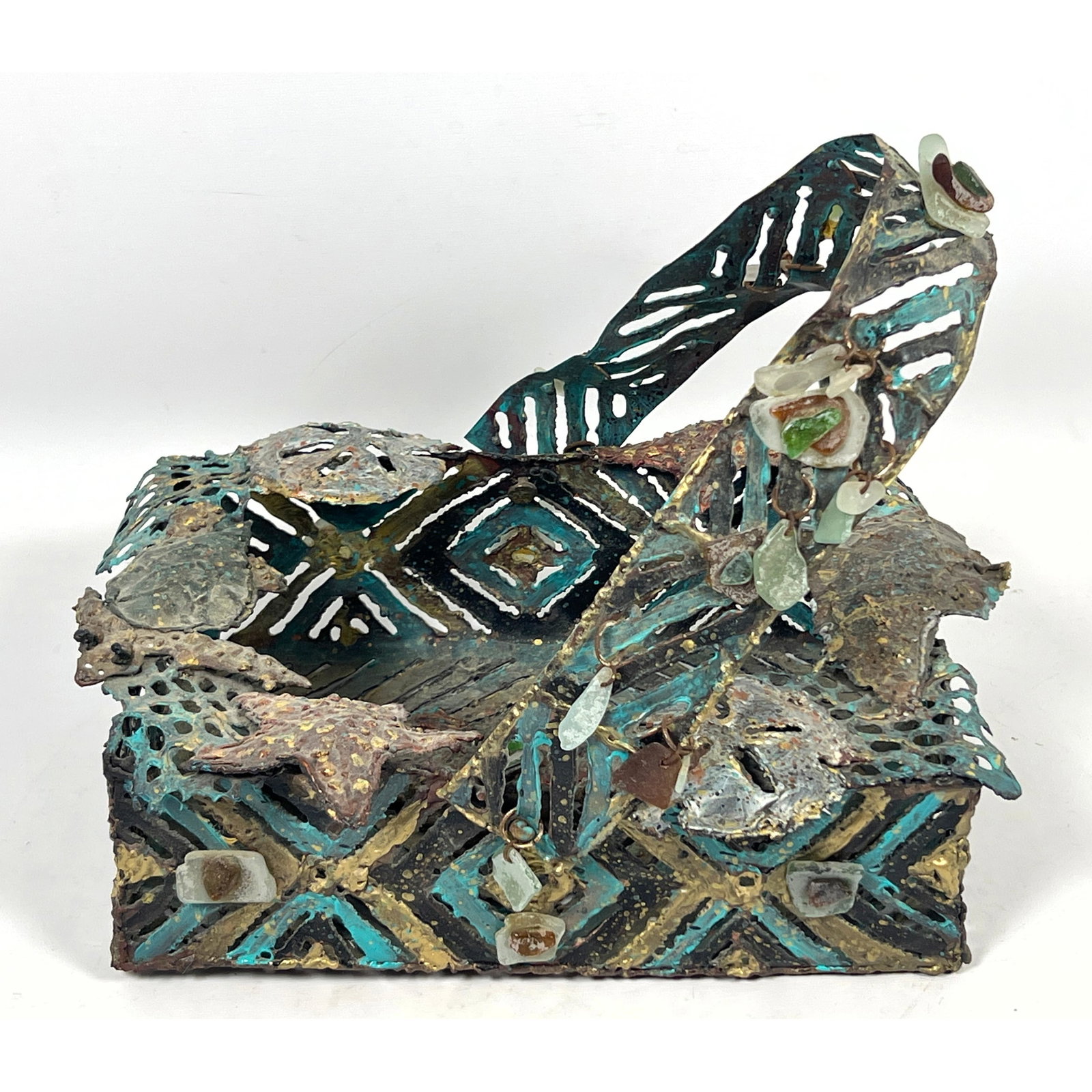 Trudi Gilliam Beachcomers basket. Brutalist copper, brass, seahorses, found stones and glass. Torch: Trudi Gilliam Beachcomers basket. Brutalist copper, brass, seahorses, found stones and glass. Torch cut. Signed. Dimensions: Height: 12 inches, Width: 15 inches, Depth: 12 inches. ---