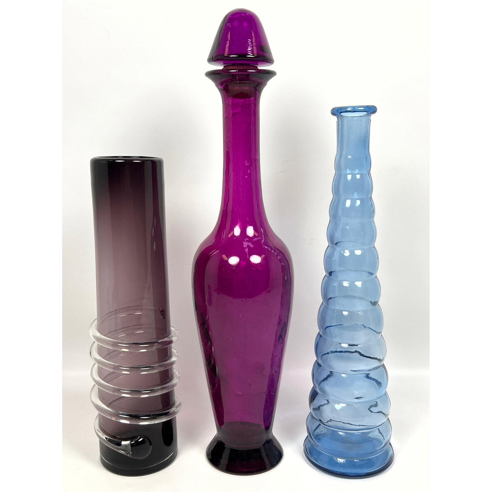 3pcs Art Glass Bottle Vases. 1 with stopper.: 3pcs Art Glass Bottle Vases. 1 with stopper. Dimensions: Height: 19 inches, Width: 4.5 inches, Depth: 4.5 inches. ---