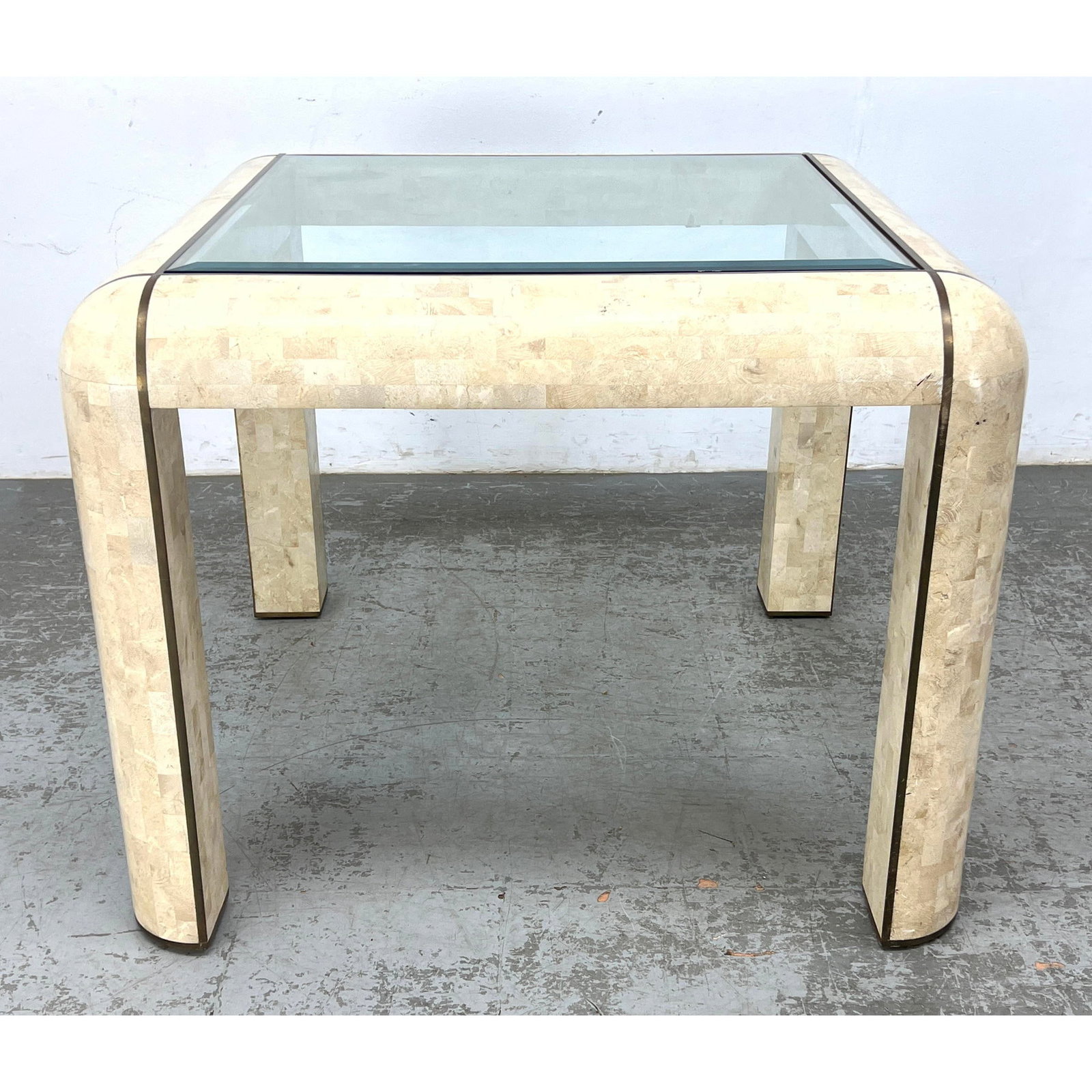 Maitland Smith style Dining Table. Fossilized Stone Tessellated Tile Inlay with Brass Trim Accents. (1 of 11)