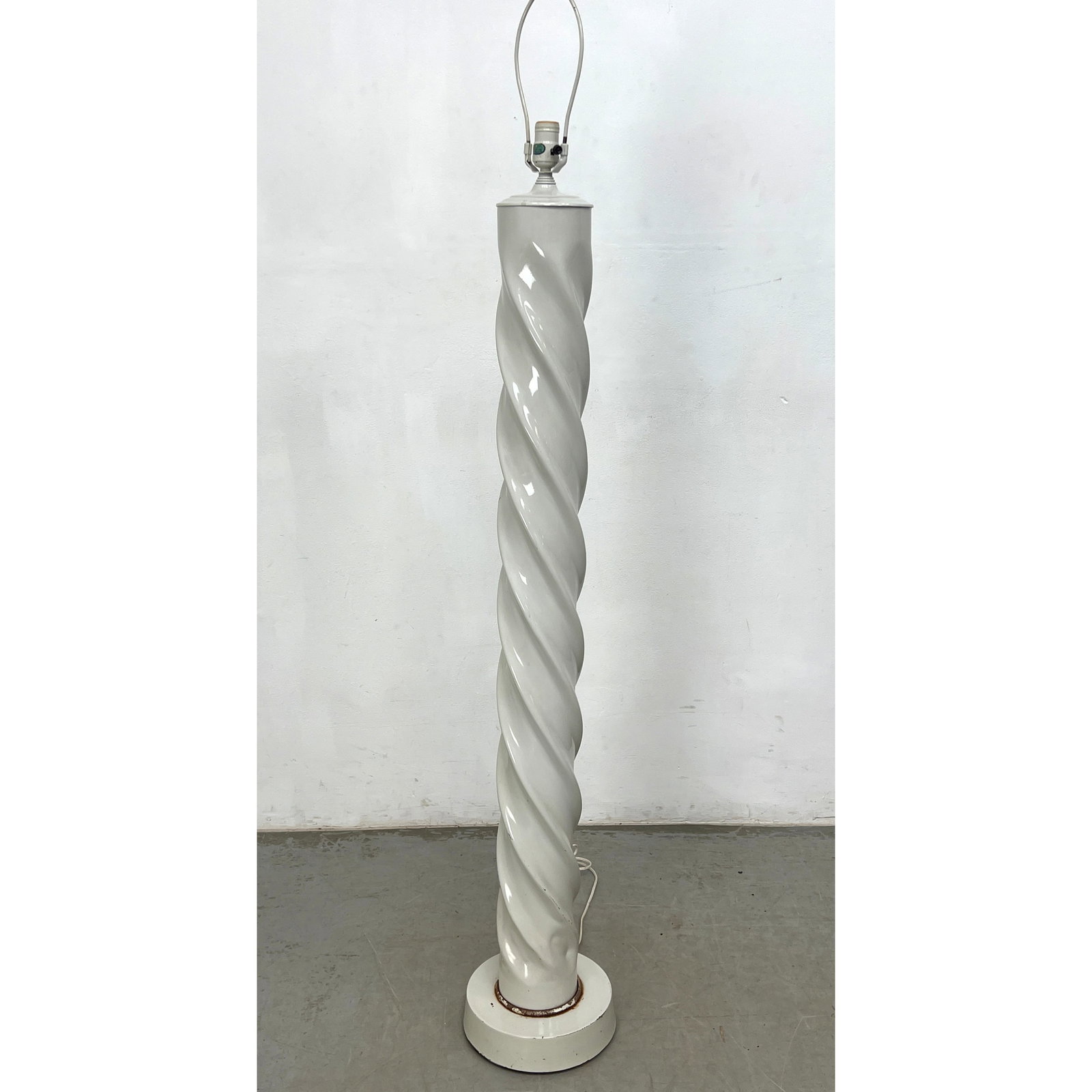 Tyndale Mid Century Modern Twisted Column Floor Lamp. White finish.: Tyndale Mid Century Modern Twisted Column Floor Lamp. White finish. Dimensions: Height: 62 inches, Width: 9 inches, Depth: 9 inches. ---