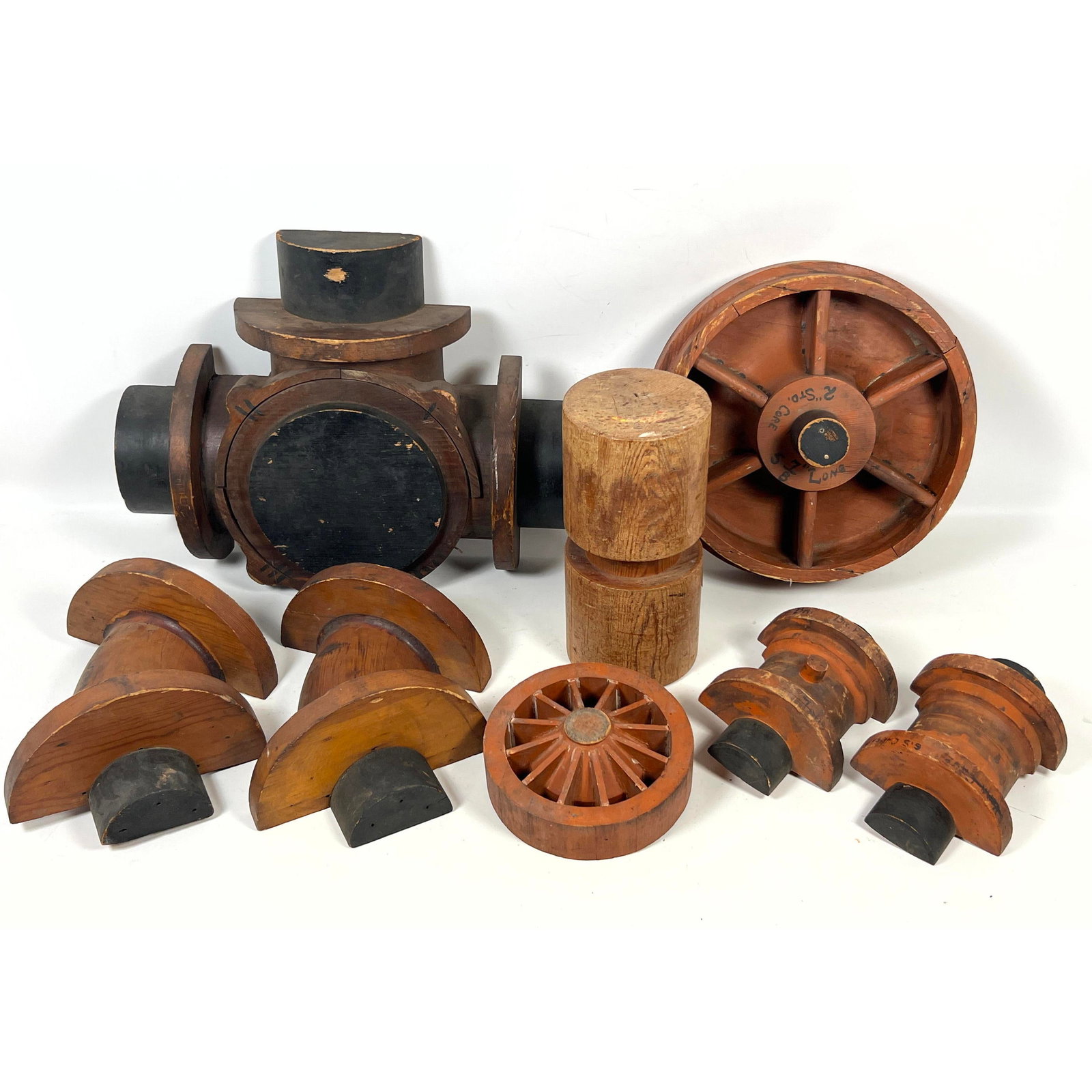 Assortment of antique industrial wooden foundry casting patterns used in the sand-casting process fo (1 of 20)