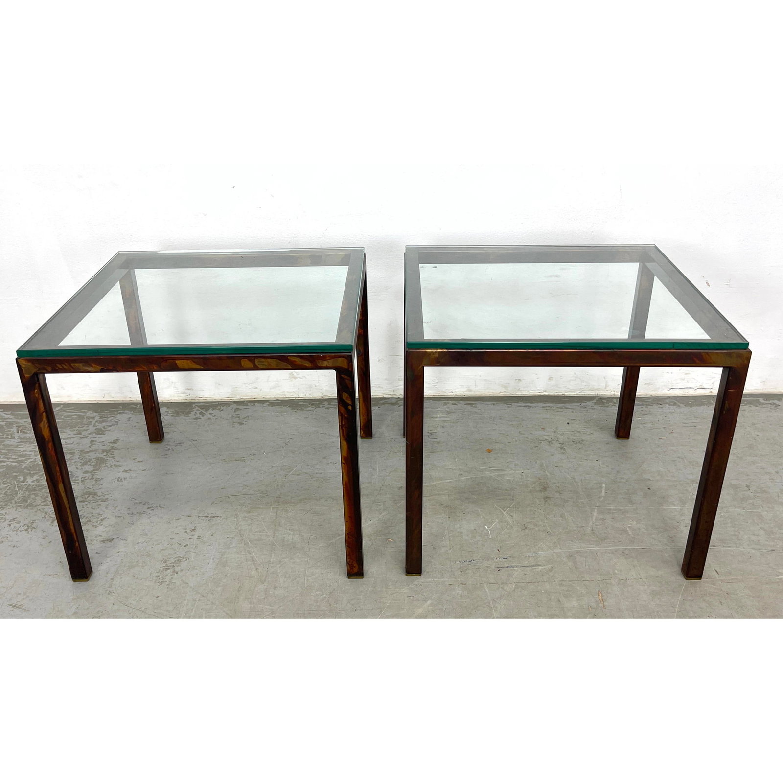 Pair Oil Spot Finish Steel and Glass Side Tables.: Pair Oil Spot Finish Steel and Glass Side Tables. Dimensions: Height: 15.5 inches, Width: 18 inches, Depth: 18 inches. ---