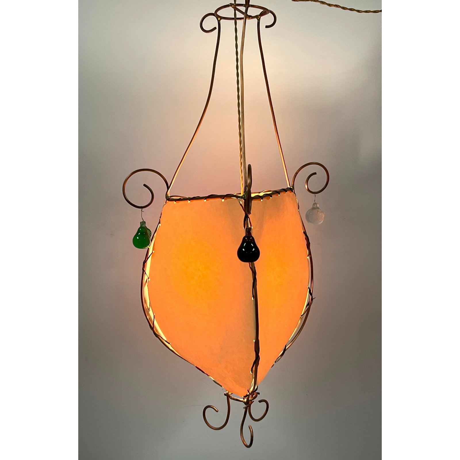 Moroccan wire and parchment hanging lamp. Moroccan wire and parchment hanging lamp. (1 of 10)