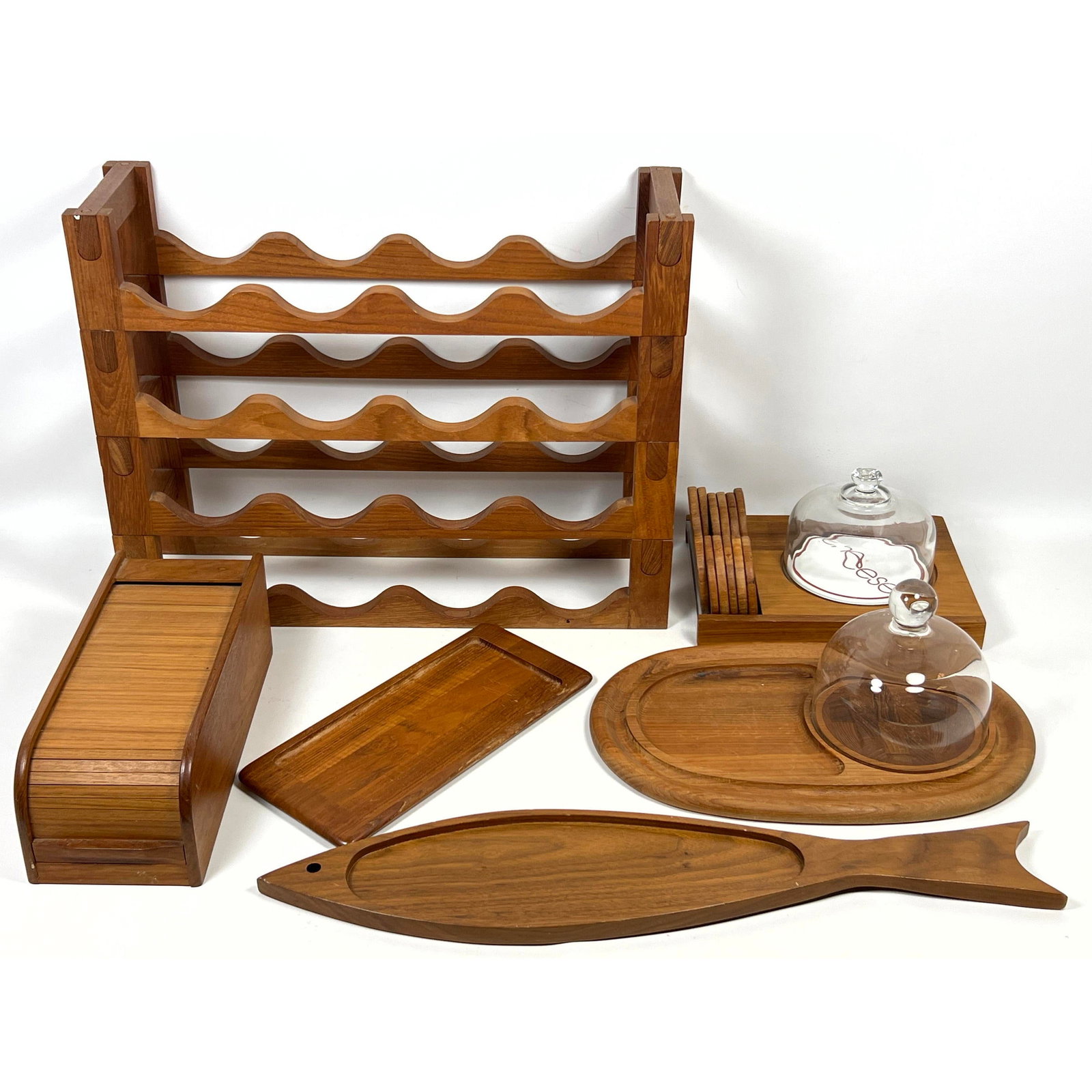 Mid Century Modern Tablewares Lot. Danish Modern Teak Accessories, Wine Rack, Trays. Dansk, Digsmed,: Mid Century Modern Tablewares Lot. Danish Modern Teak Accessories, Wine Rack, Trays. Dansk, Digsmed, Dimensions: Height: 18.5 inches, Width: 23.75 inches, Depth: 7 inches. ---