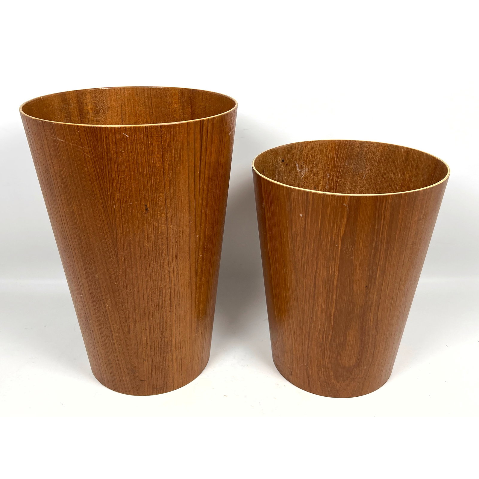 2 Vintage Danish Modern Teak Waste Baskets, made in Sweden: 2 Vintage Danish Modern Teak Waste Baskets, made in Sweden Dimensions: Height: 15.5 inches, Width: 10.5 inches, Depth: 10.5 inches. - Additional Dimensions: Smaller H: 12.5 inches, W: 10 inches, D: 10