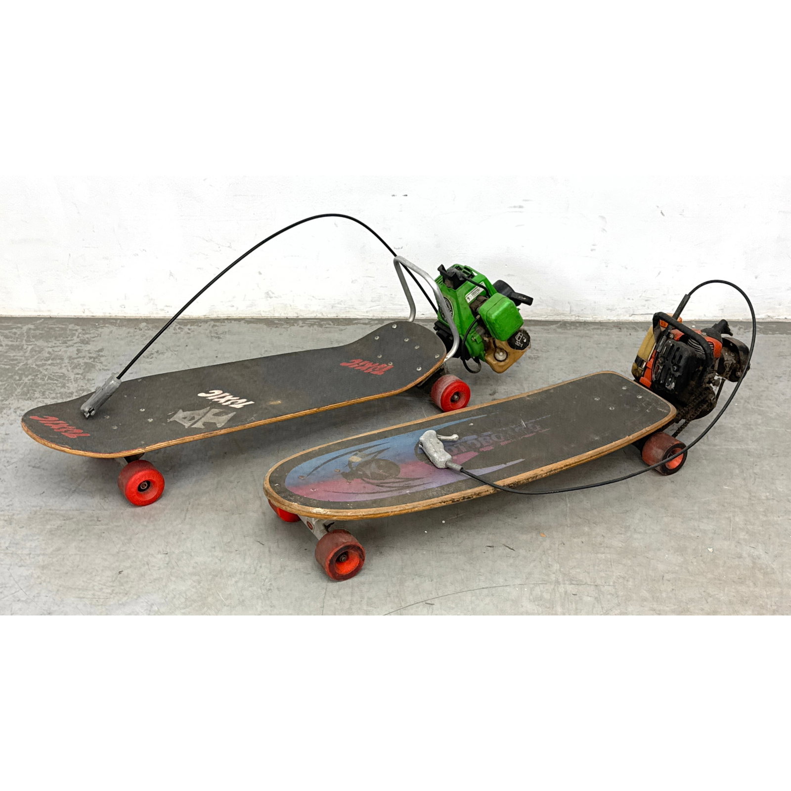 2pcs Vintage Motorized Skateboards. Motoboard International.: 2pcs Vintage Motorized Skateboards. Motoboard International. Dimensions: Height: 11.5 inches, Width: 36 inches, Depth: 10 inches. ---