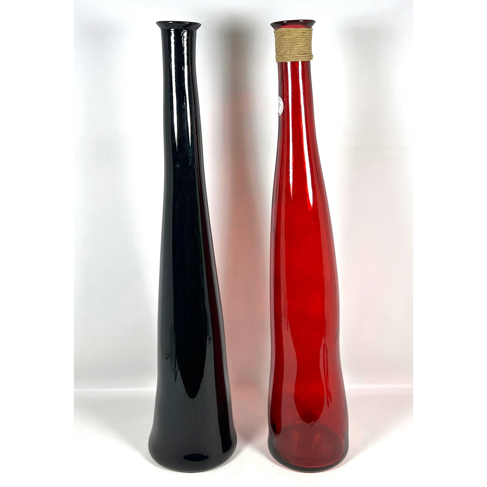 Vidrios San Miguel in Spain art glass floor vases. 100 percent recycled hand-blown glass: Vidrios San Miguel in Spain art glass floor vases. 100 percent recycled hand-blown glass Dimensions: Height: 39 inches, Width: 9 inches, Depth: 9 inches. ---