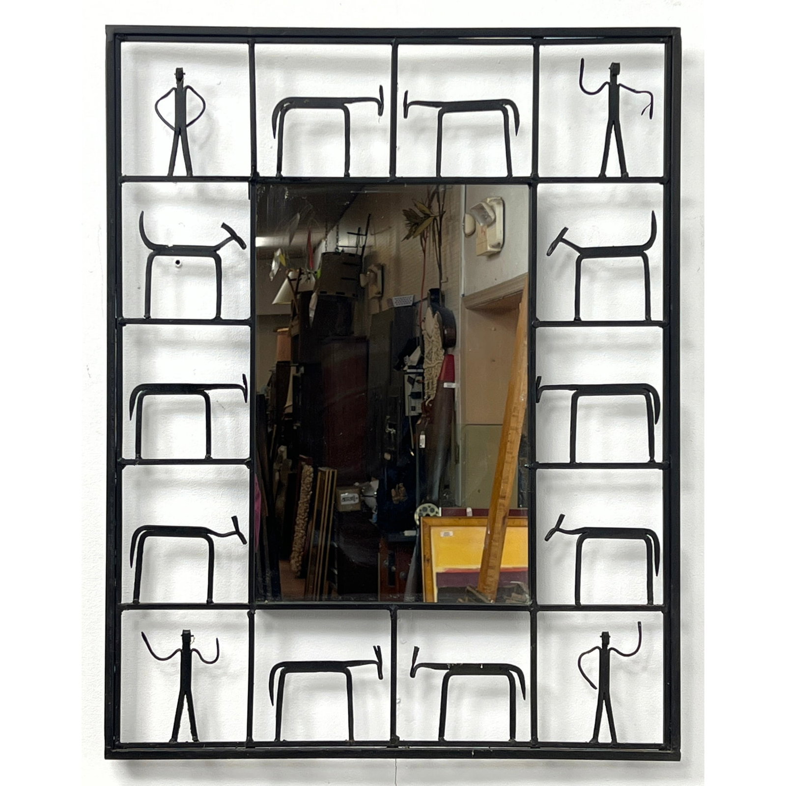 After FREDERICK WEINBERG Iron Figural Frame Wall Mirror. Iron Stick Animal and Human Figures. Not Ma: After FREDERICK WEINBERG Iron Figural Frame Wall Mirror. Iron Stick Animal and Human Figures. Not Marked. Dimensions: Height: 31 inches, Width: 24 inches. ---