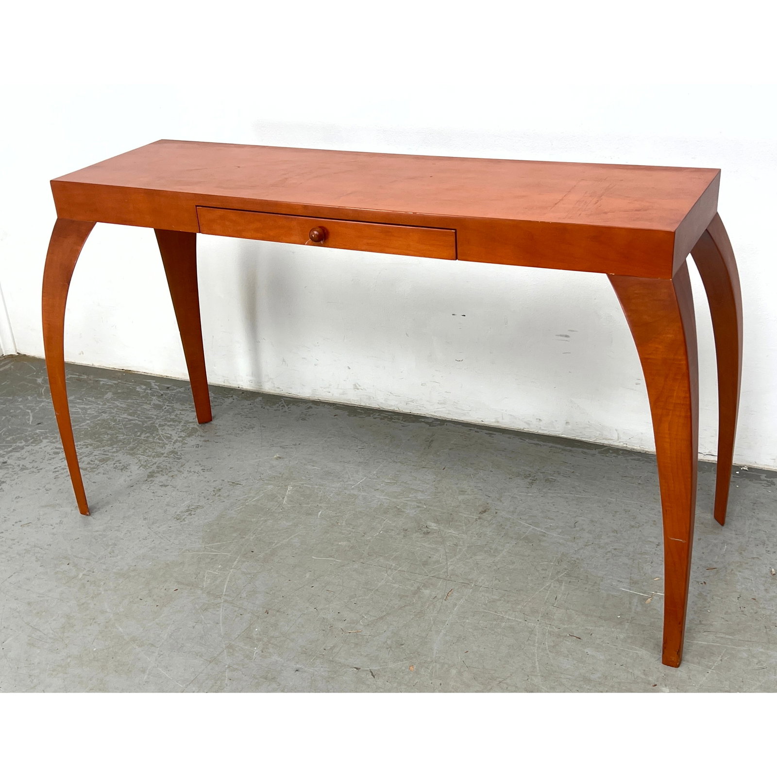Dialogica Post Modern Writing Table Console with Single Drawer. Tapering saber-style legs that curve: Dialogica Post Modern Writing Table Console with Single Drawer. Tapering saber-style legs that curve outward from the apron. possibly Dialogica, New York. Dimensions: Height: 30.5 inches, Width: 54