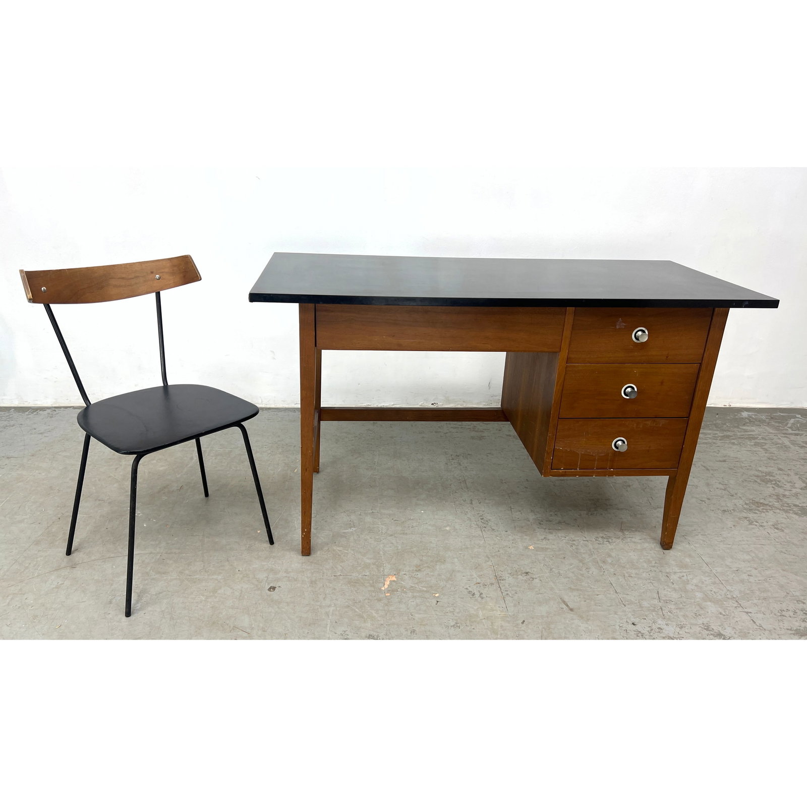 Vintage Stanley Walnut Black Laminate Top Single Pedestal Desk with Clifford Pascoe Chair: Vintage Stanley Walnut Black Laminate Top Single Pedestal Desk with Clifford Pascoe Chair Dimensions: Height: 29.5 inches, Width: 50 inches, Depth: 22 inches. - Additional Dimensions: Chair H: 29.25
