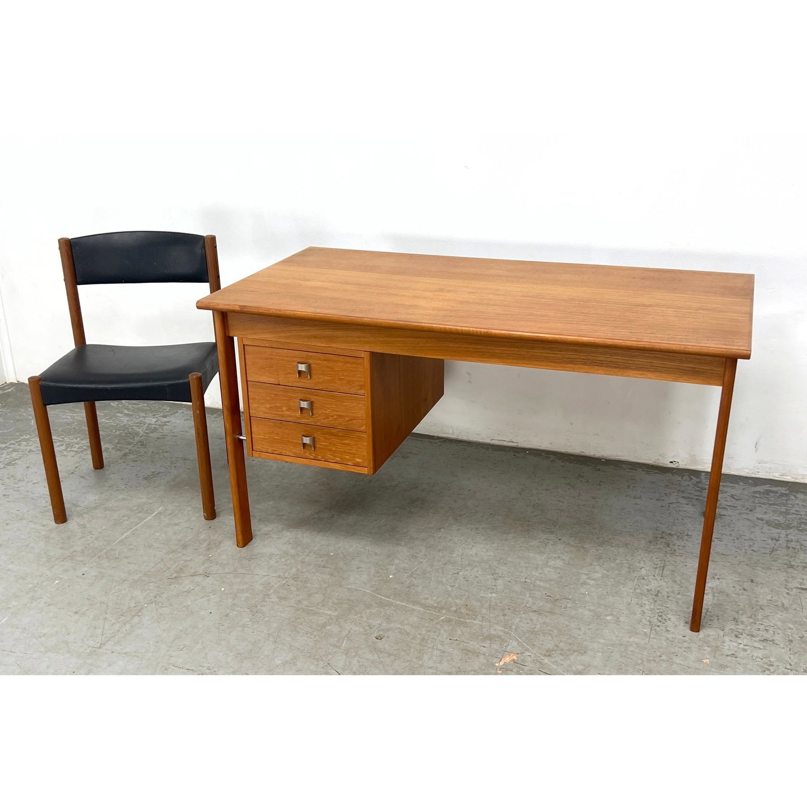 Danish Modern Teak Desk and Side Chair Denmark. Sliding top to reveal hidden compartment. (1 of 15)
