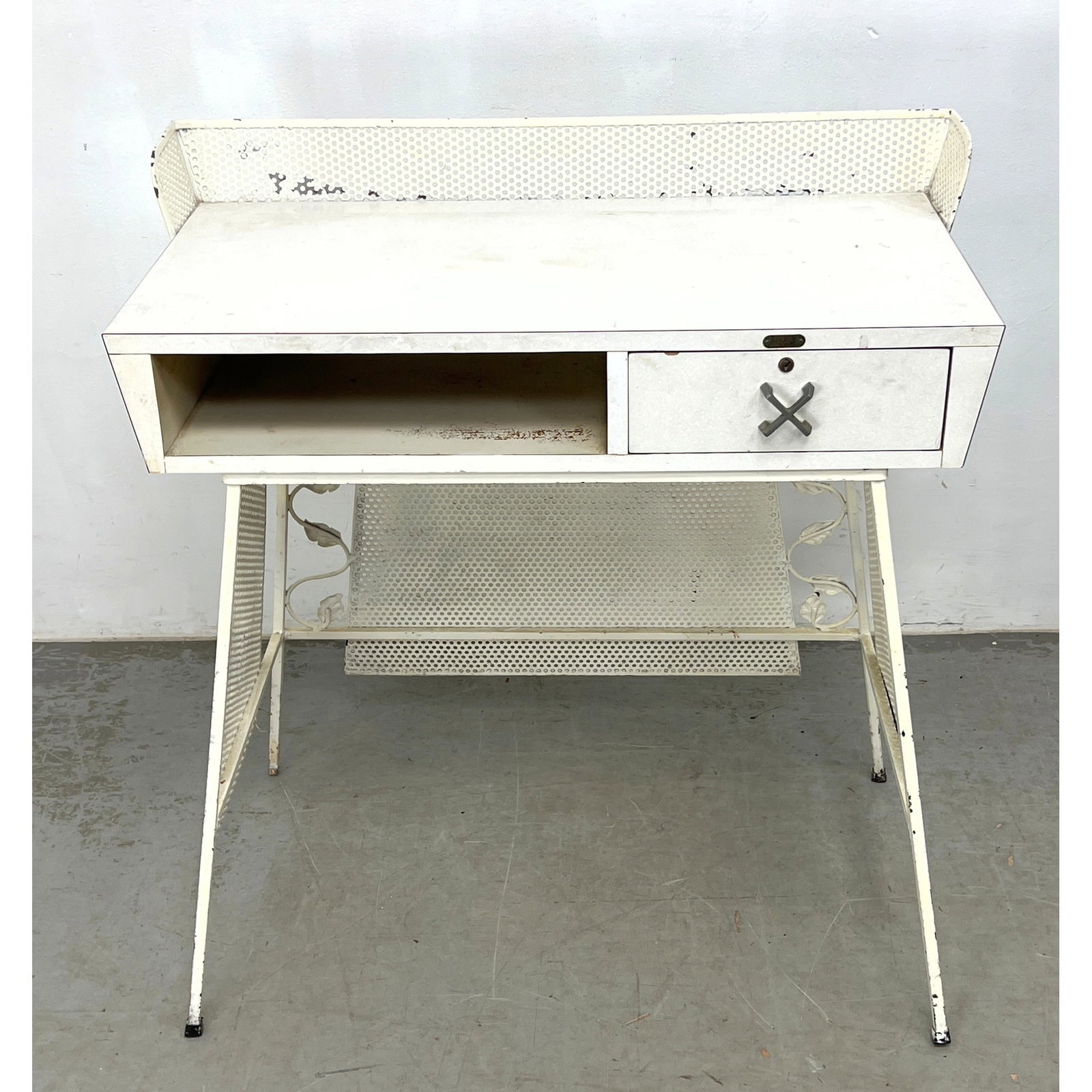 Modecraft New York Mid-Century American Modern Iron Frame Desk, 1950s. White patterned laminate.: Modecraft New York Mid-Century American Modern Iron Frame Desk, 1950s. White patterned laminate. Dimensions: Height: 35.5 inches, Width: 33.75 inches, Depth: 18 inches. ---