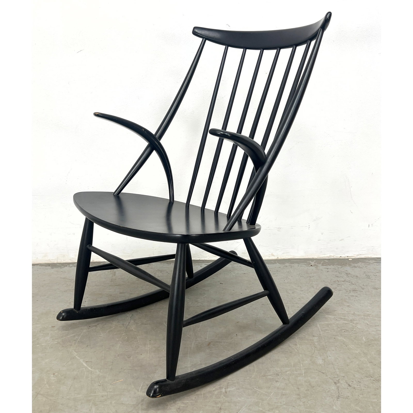 Scandinavian modern rocking chair designed by Illum Wikkelso for N. Eilersen: Scandinavian modern rocking chair designed by Illum Wikkelso for N. Eilersen Dimensions: Height: 36.5 inches, Width: 22 inches, Depth: 29 inches. ---
