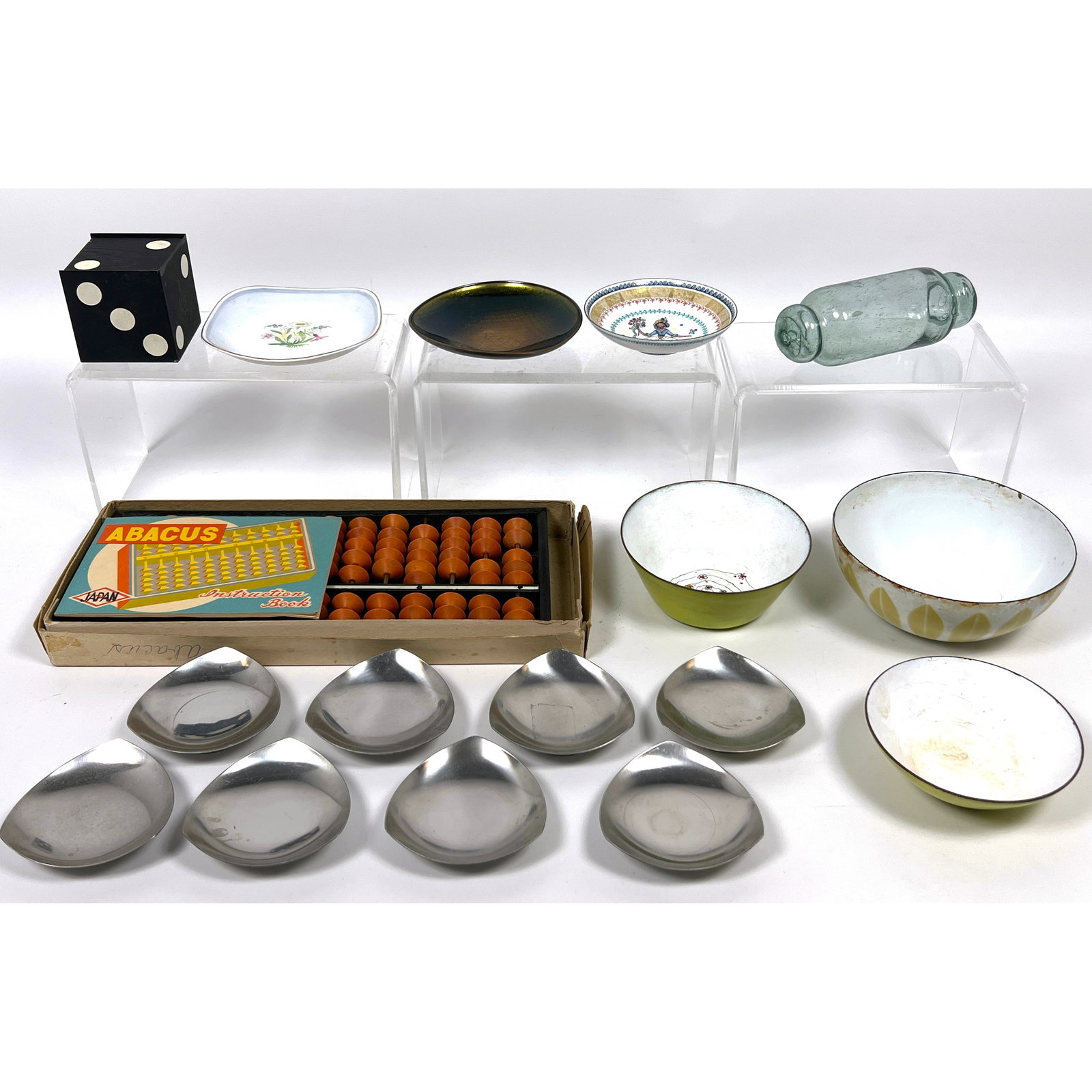 Assortment of mid-century and international decorative items features a variety of materials includi (1 of 20)