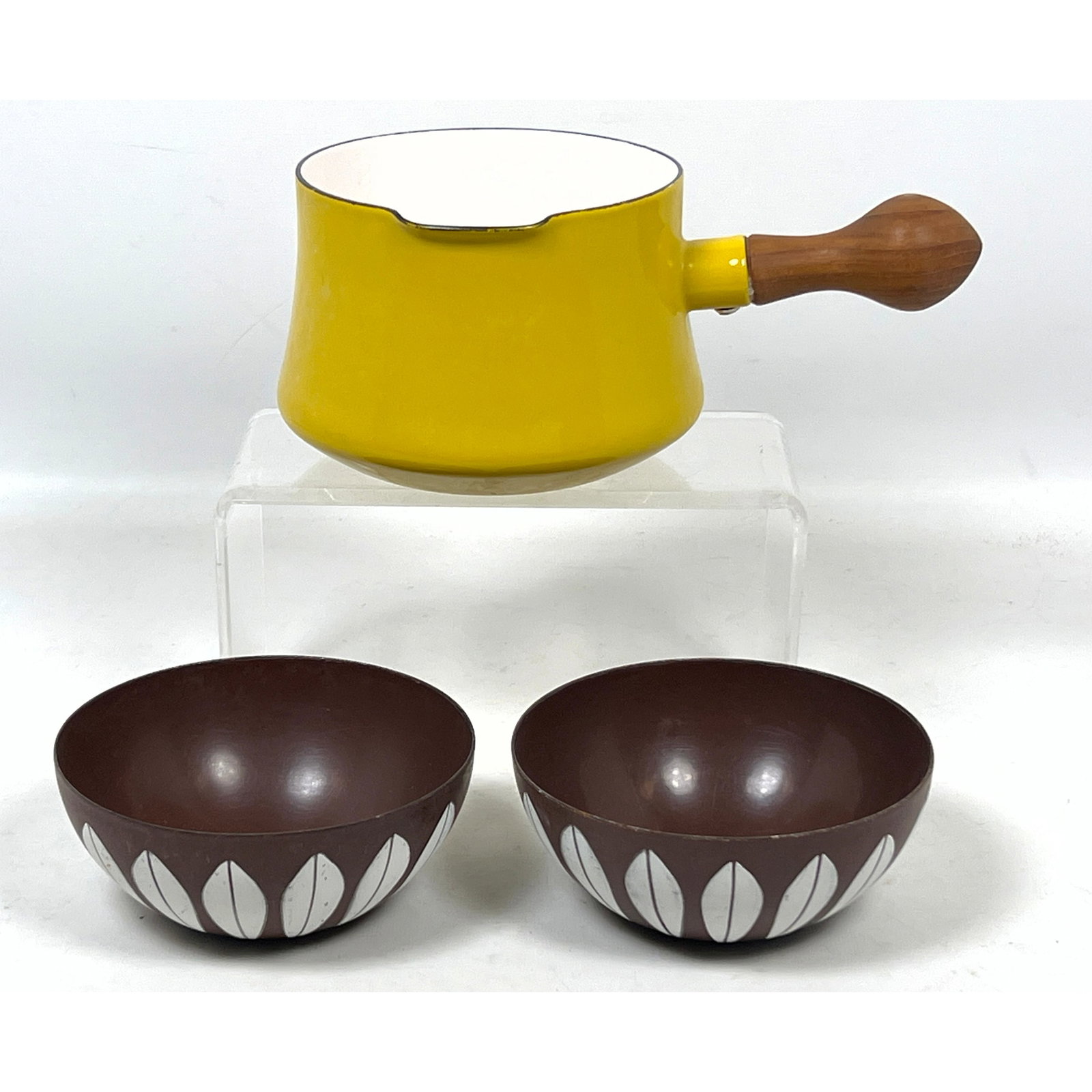 3pcs. Dansk Kobenstyle sauce Pan and 2 Cathrineholm bowls: 3pcs. Dansk Kobenstyle sauce Pan and 2 Cathrineholm bowls Dimensions: Height: 4.5 inches, Width: 9 inches, Depth: 6 inches. --- US Packing and Shipping charge: In house shipping available. Will be cal