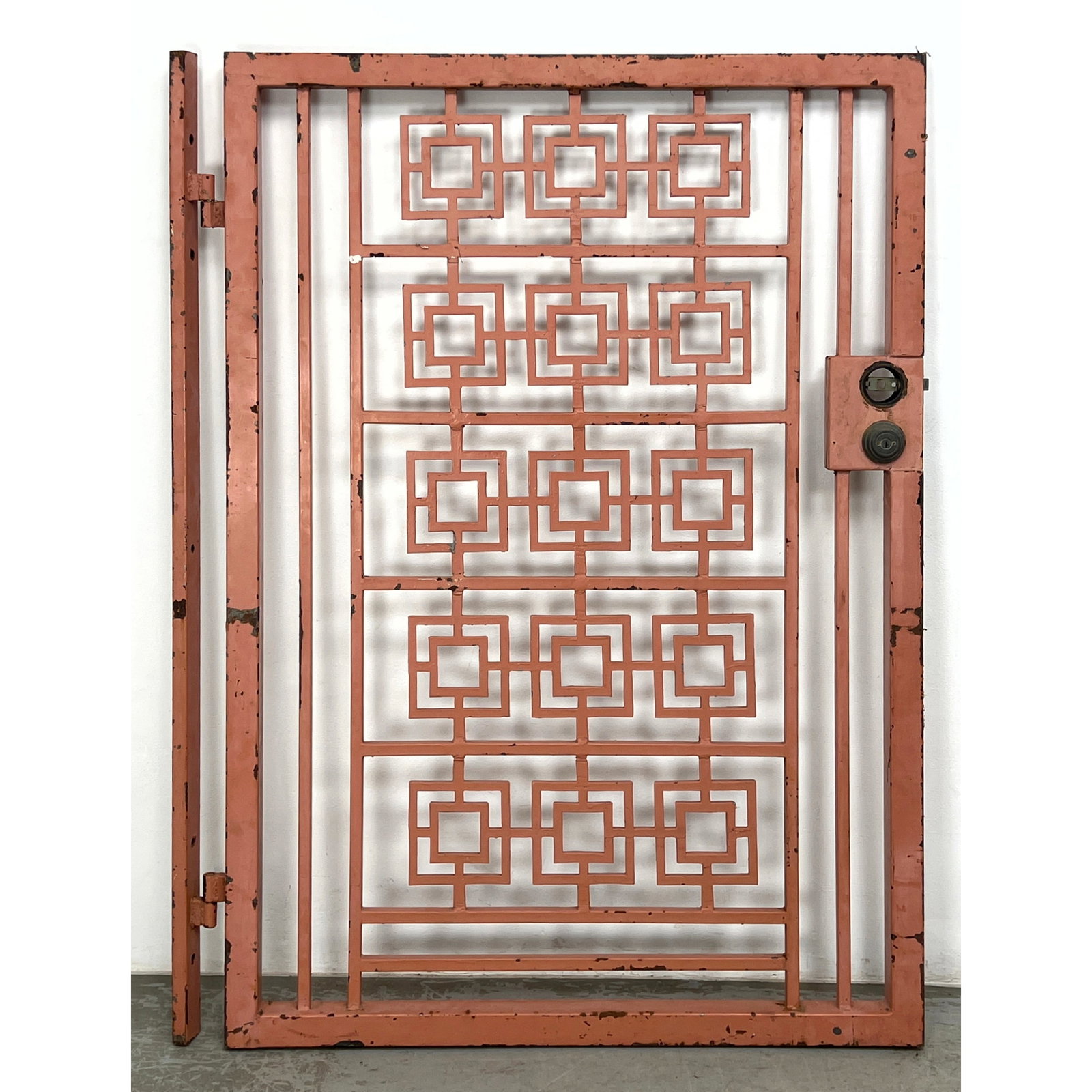 Architectural Iron Security Gate. Painted Interlocking Geometric Squares in Frame. Door and Wall Mou: Architectural Iron Security Gate. Painted Interlocking Geometric Squares in Frame. Door and Wall Mounted Jamb. Dimensions: Height: 45.5 inches, Width: 60.25 inches, Depth: 4 inches. ---