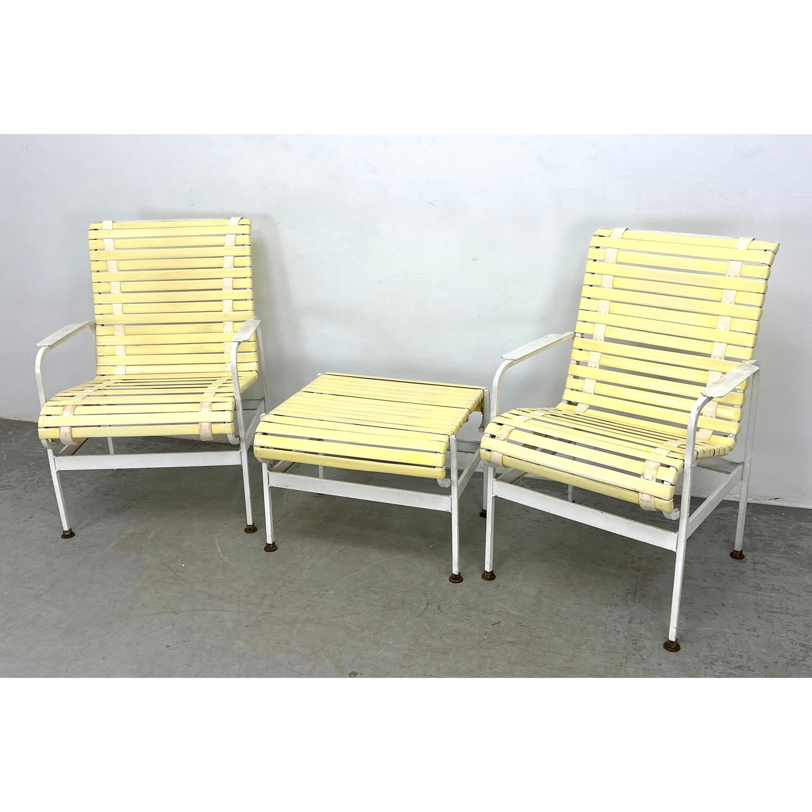 3pc Outdoor Furniture. Two Arm Lounge Chairs and Single Ottoman. Pale Yellow Rubber Straps on White: 3pc Outdoor Furniture. Two Arm Lounge Chairs and Single Ottoman. Pale Yellow Rubber Straps on White Painted Iron Frames. Garden, Patio, Deck. Dimensions: Height: 34.5 inches, Width: 24.5 inches,
