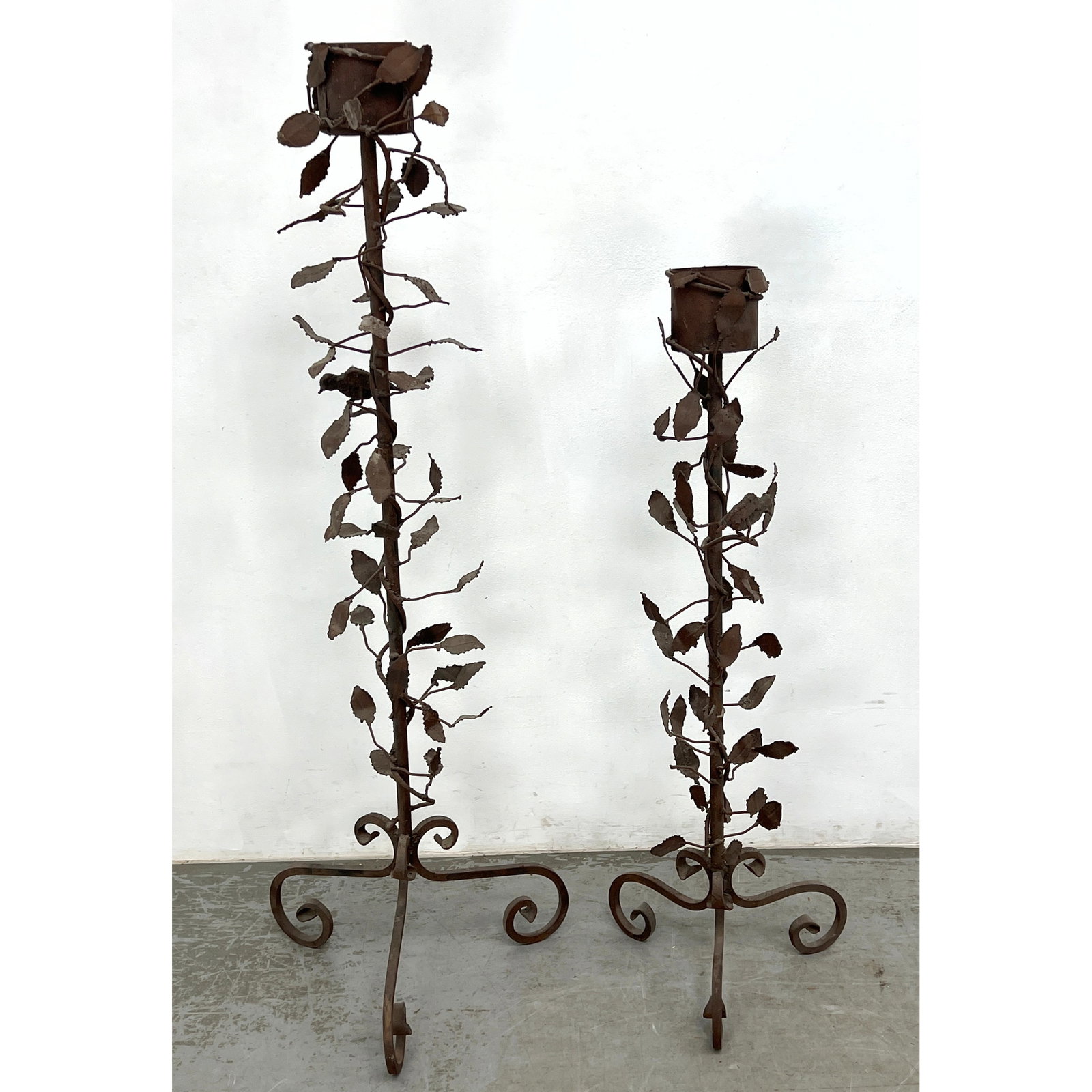 Pair Floor Standing Torchiere Candle Holders. Floral designs. welded bird figure.: Pair Floor Standing Torchiere Candle Holders. Floral designs. welded bird figure. Dimensions: Height: 52 inches, Width: 17 inches, Depth: 17 inches. ---